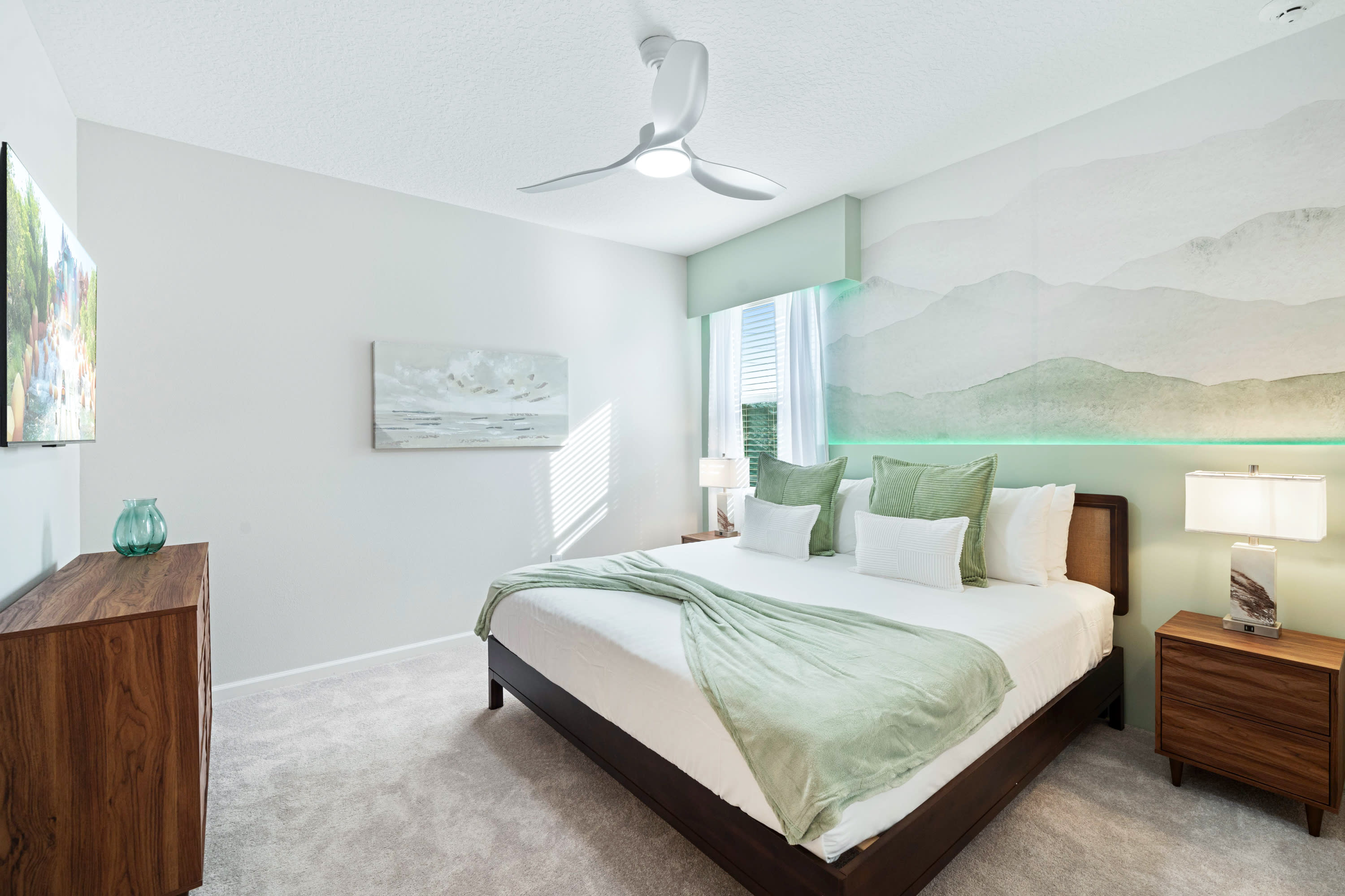 Comfortable King Room With Modern Decor And Plenty Of Natural Light