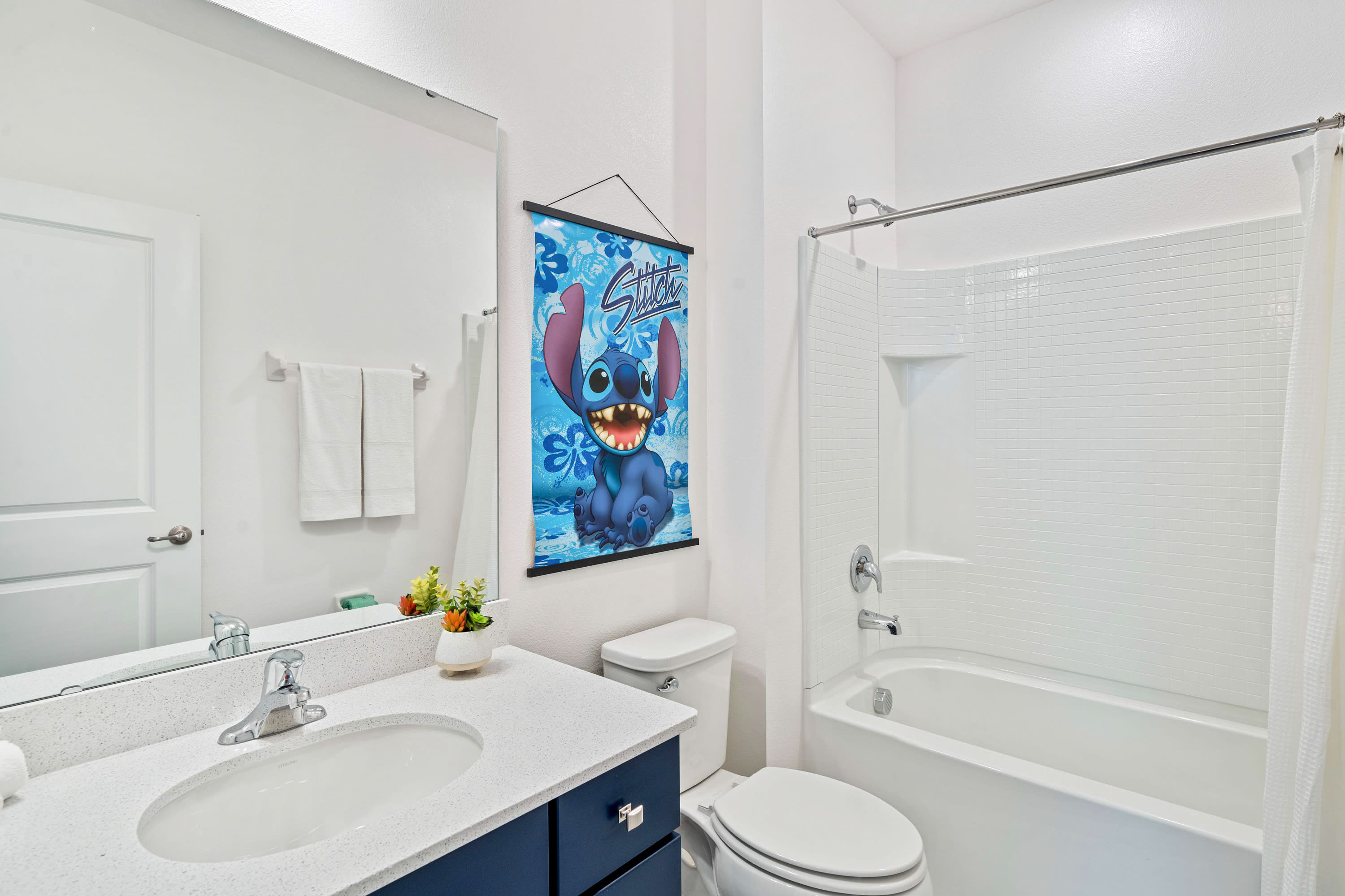 Bright Bathroom With A Clean Design And Elegant Vanity