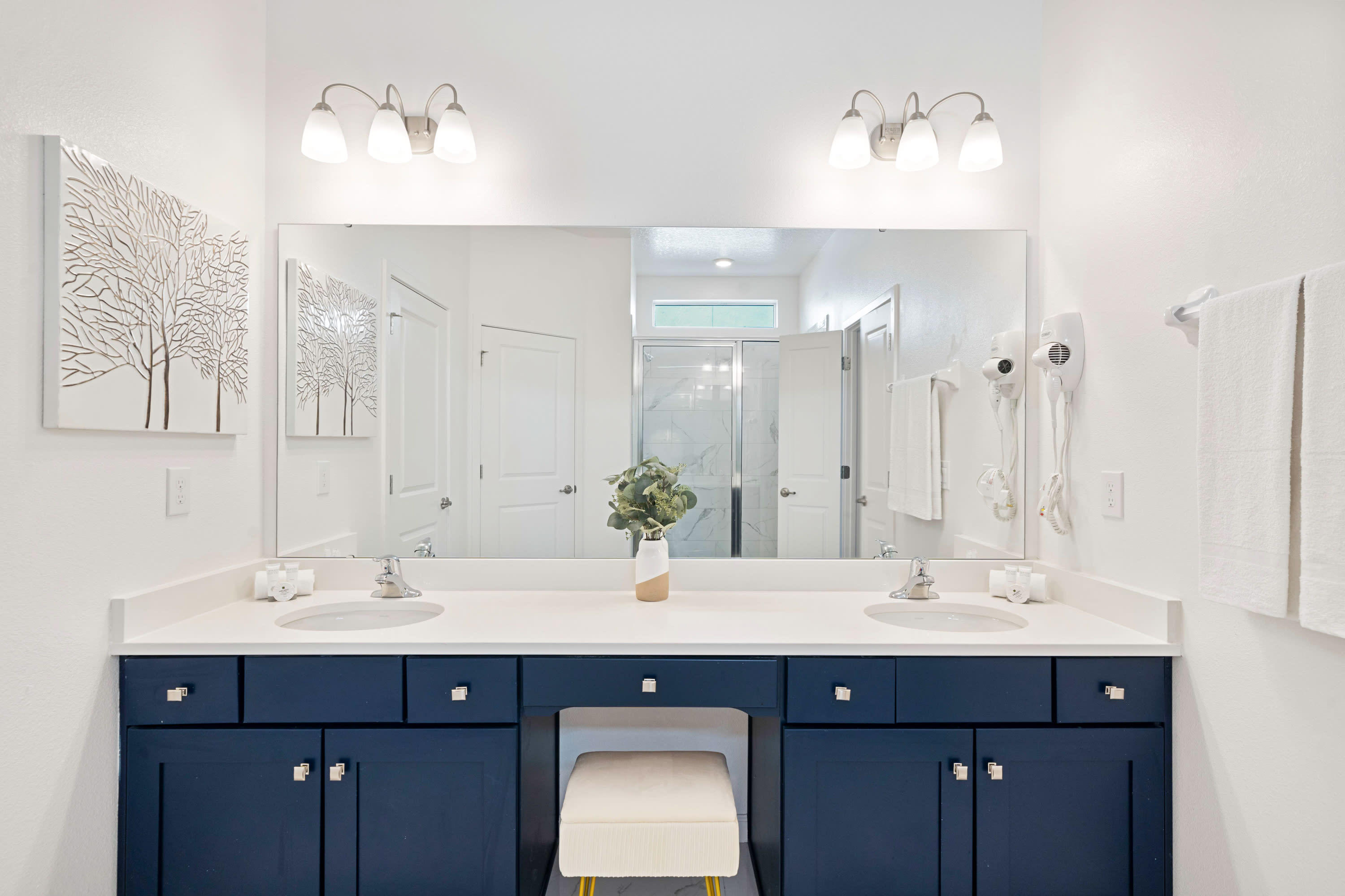 Bright Bathroom With A Clean Design And Elegant Vanity