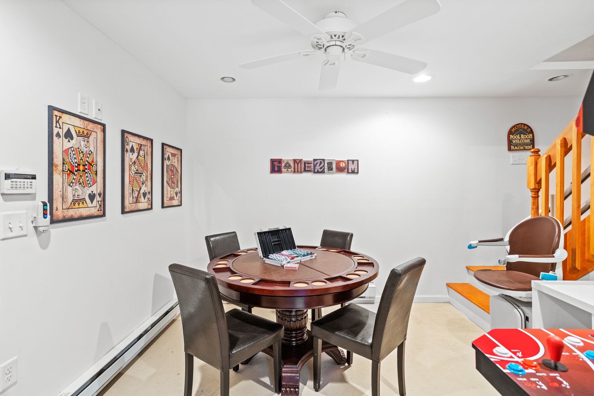 A well-lit and inviting game room with a poker table and comfortable seating, ideal for hours of fun and conversation.

Chair Lift - not operational