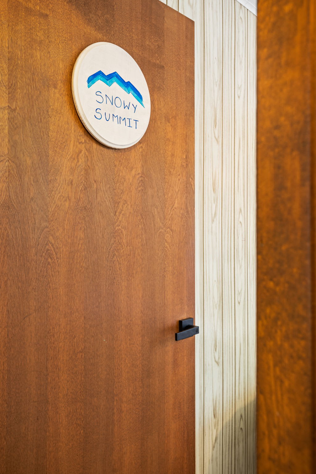  A welcoming detail showcasing the unique branding of the property, adding charm and personality to the space.