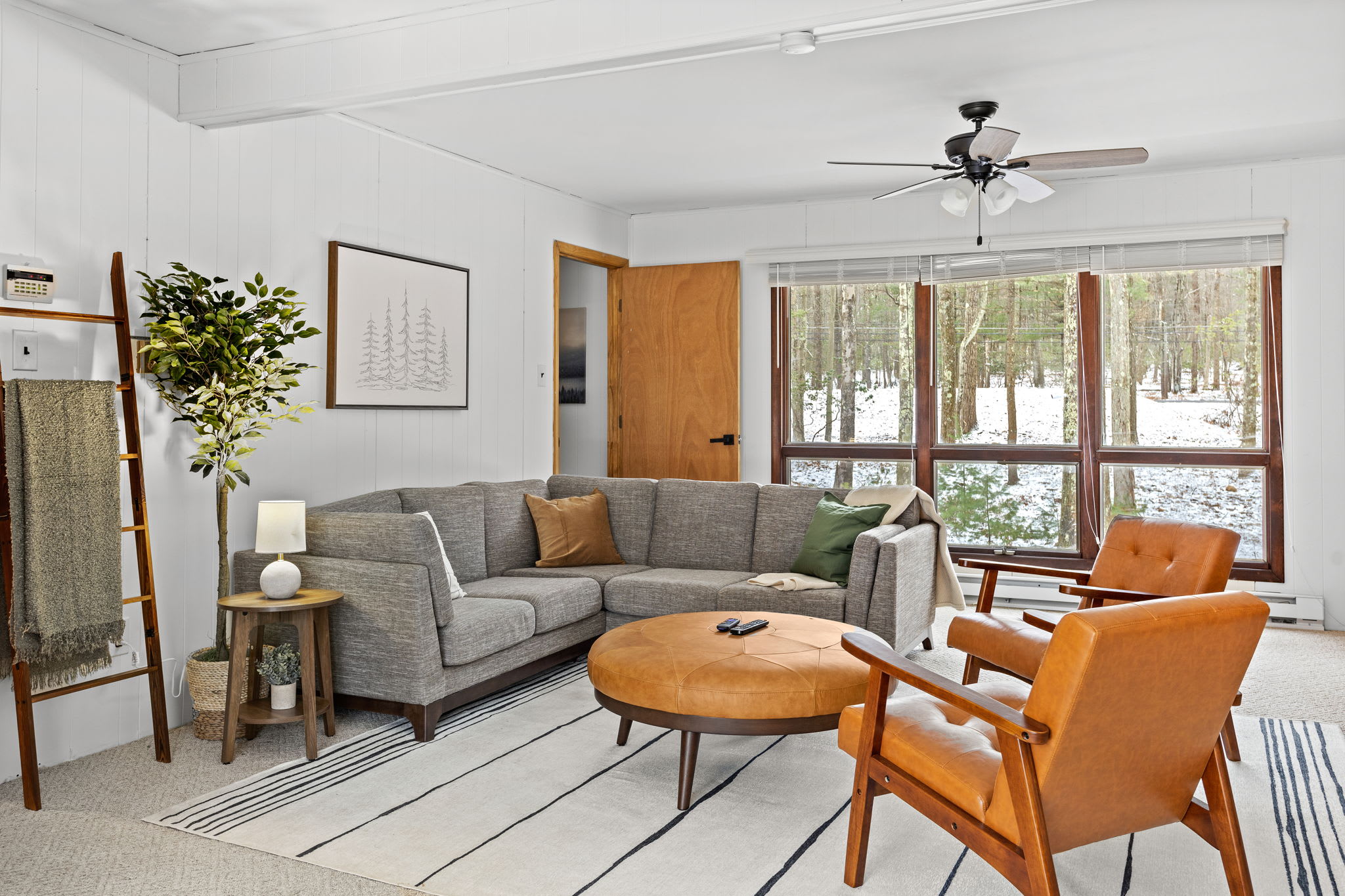 A thoughtfully designed lounge area with warm, earthy tones, inviting you to relax and unwind.