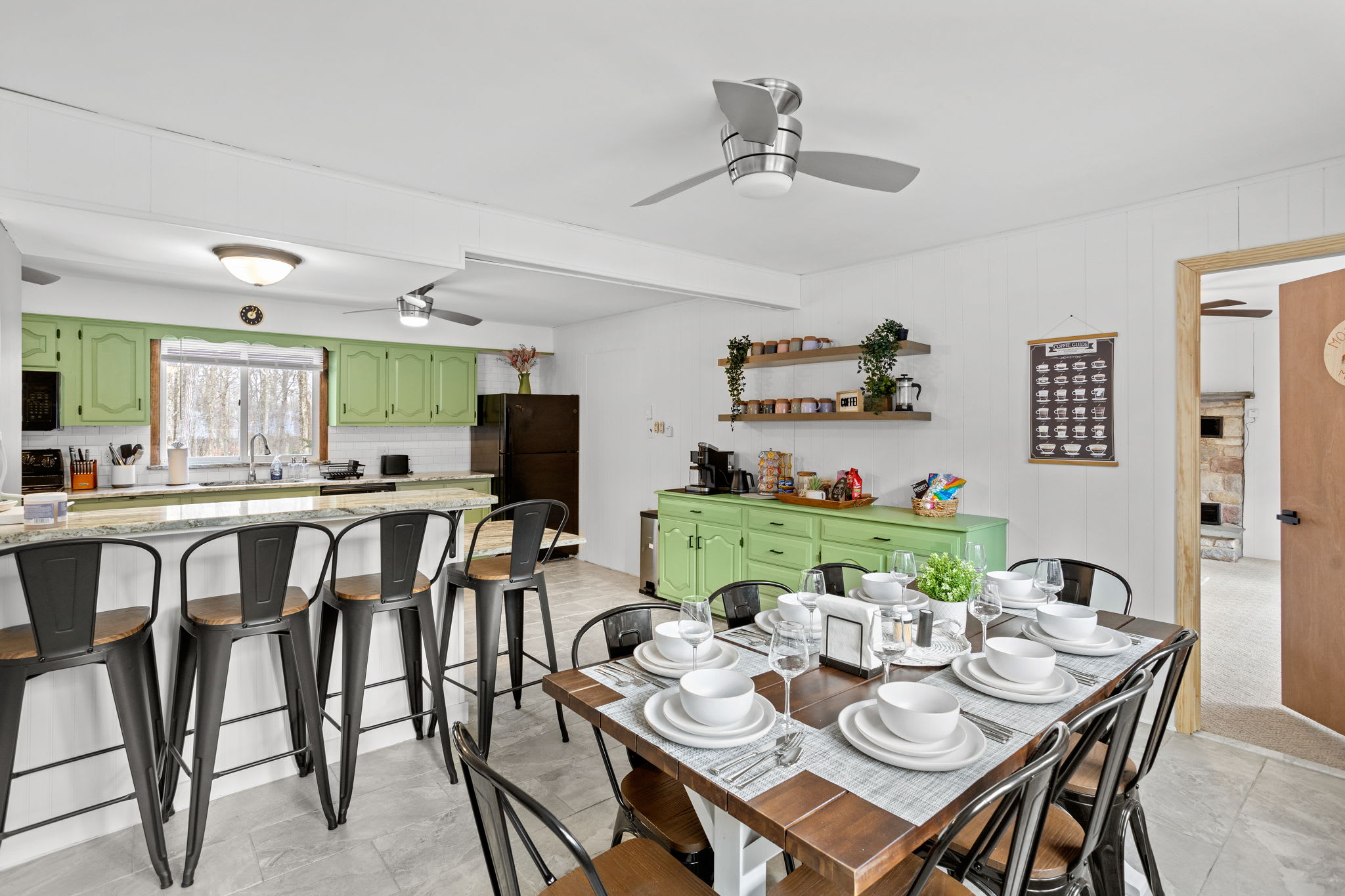 A spacious dining area seamlessly blending into the kitchen, perfect for entertaining and group gatherings.