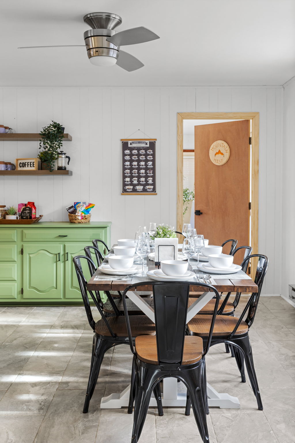 A welcoming corner perfect for family meals, featuring farmhouse-style decor and a cozy atmosphere.