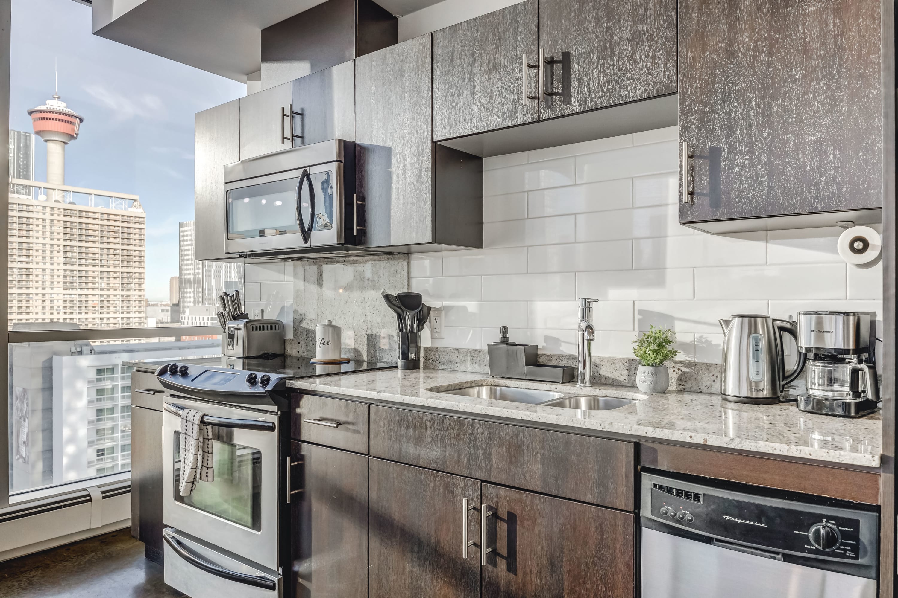 Fully equipped kitchen with silver appliances
