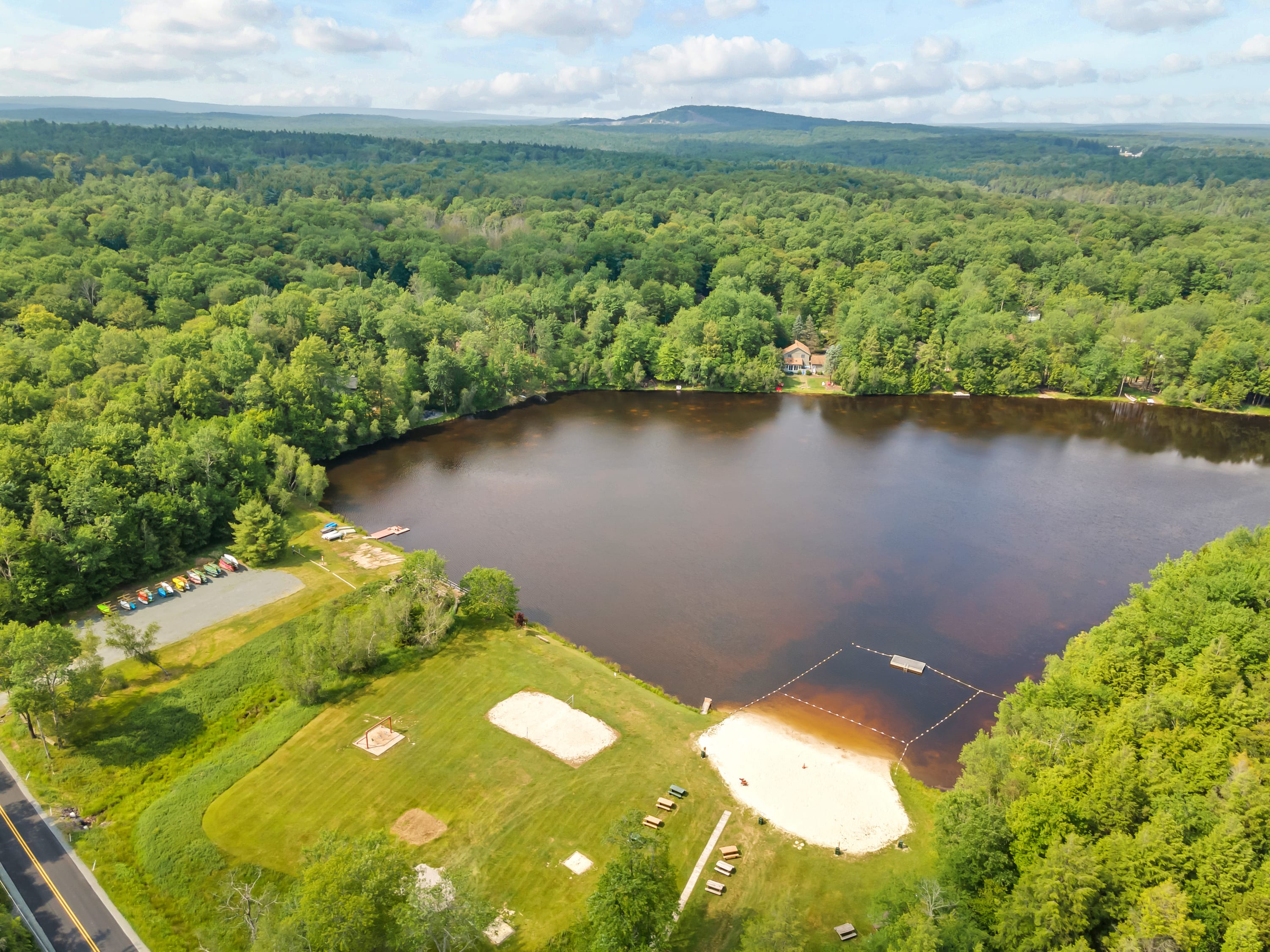 Experience the serene charm of Lake Guenevere, offering peaceful views and a perfect setting for relaxation.