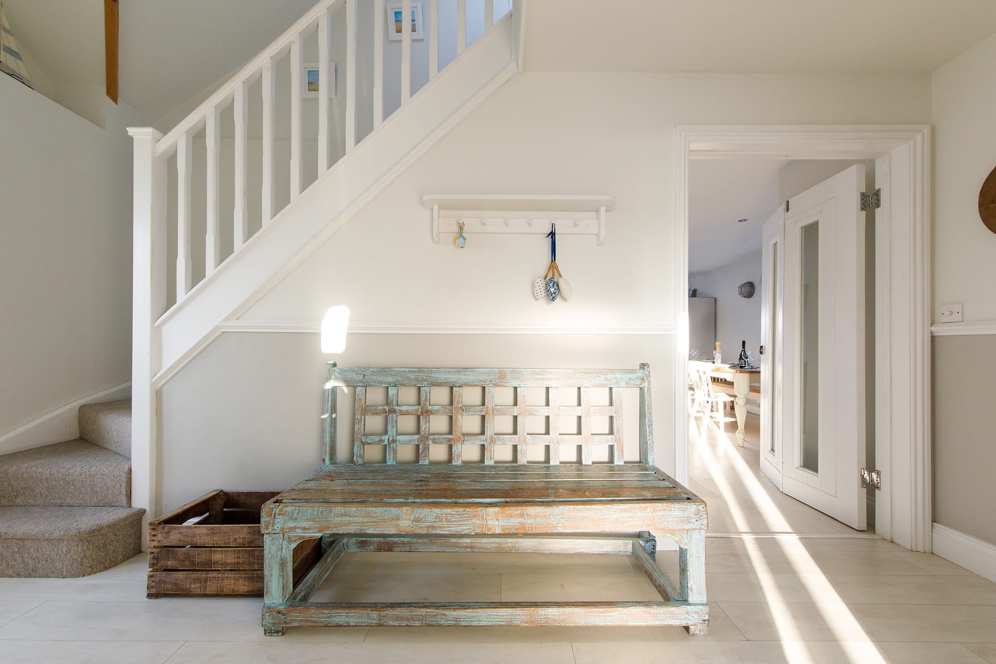 There is handy seating in the hall, great for getting shoes on and ready to head down to the beach!