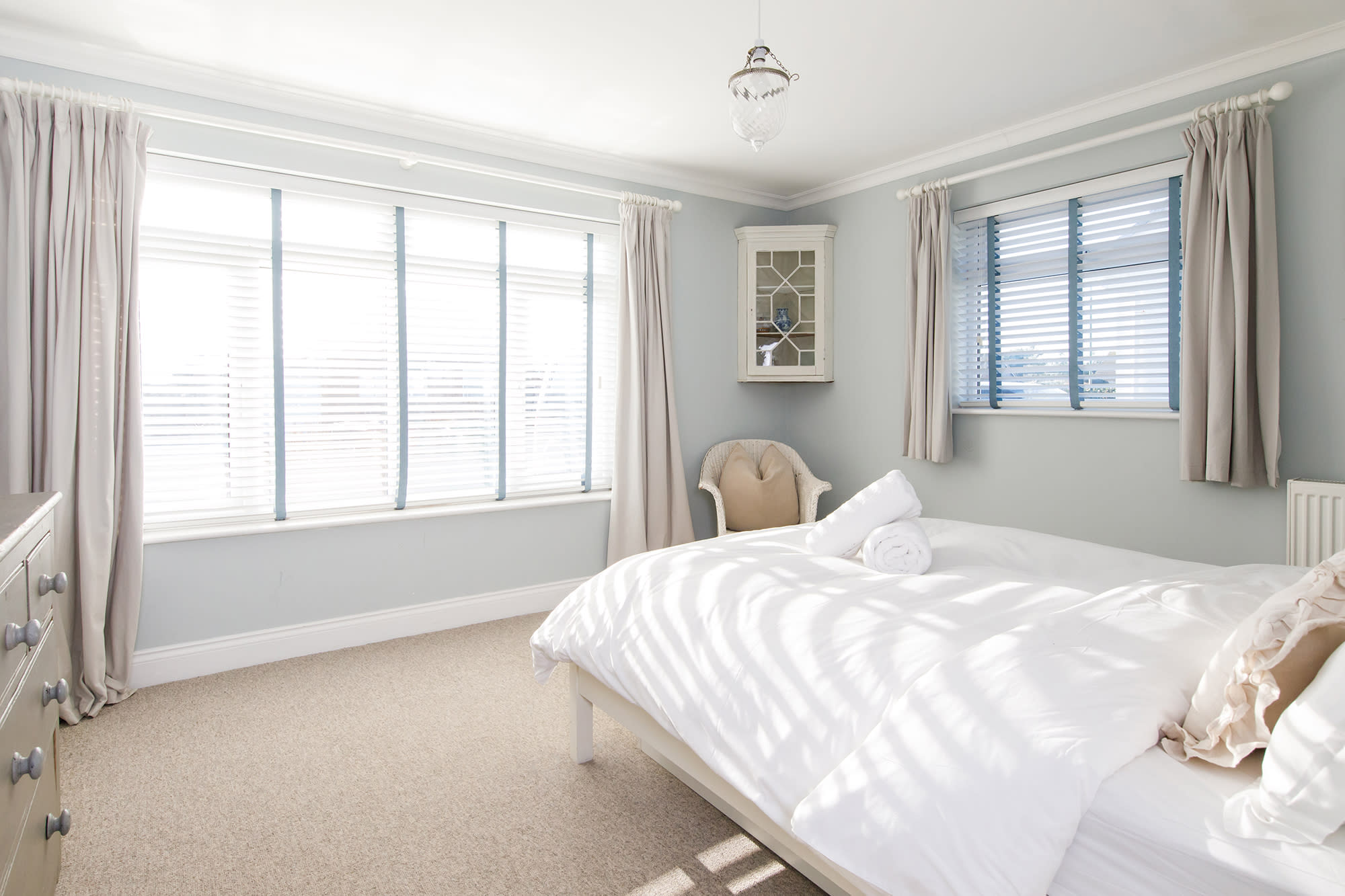 The rooms has two large windows to let plenty of daylight flood in.