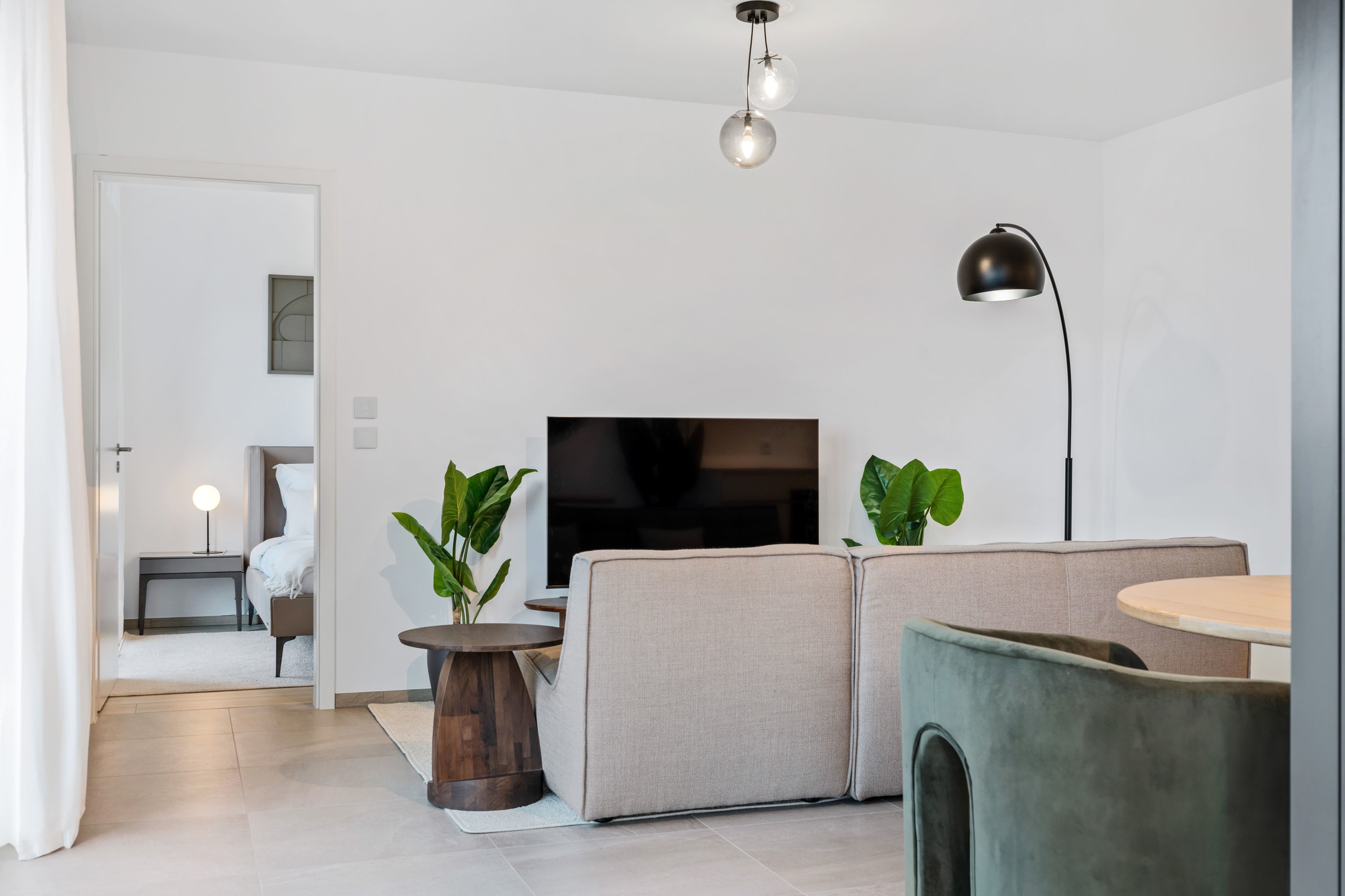Cozy up in our modern living space, perfect for relaxing after a city adventure.