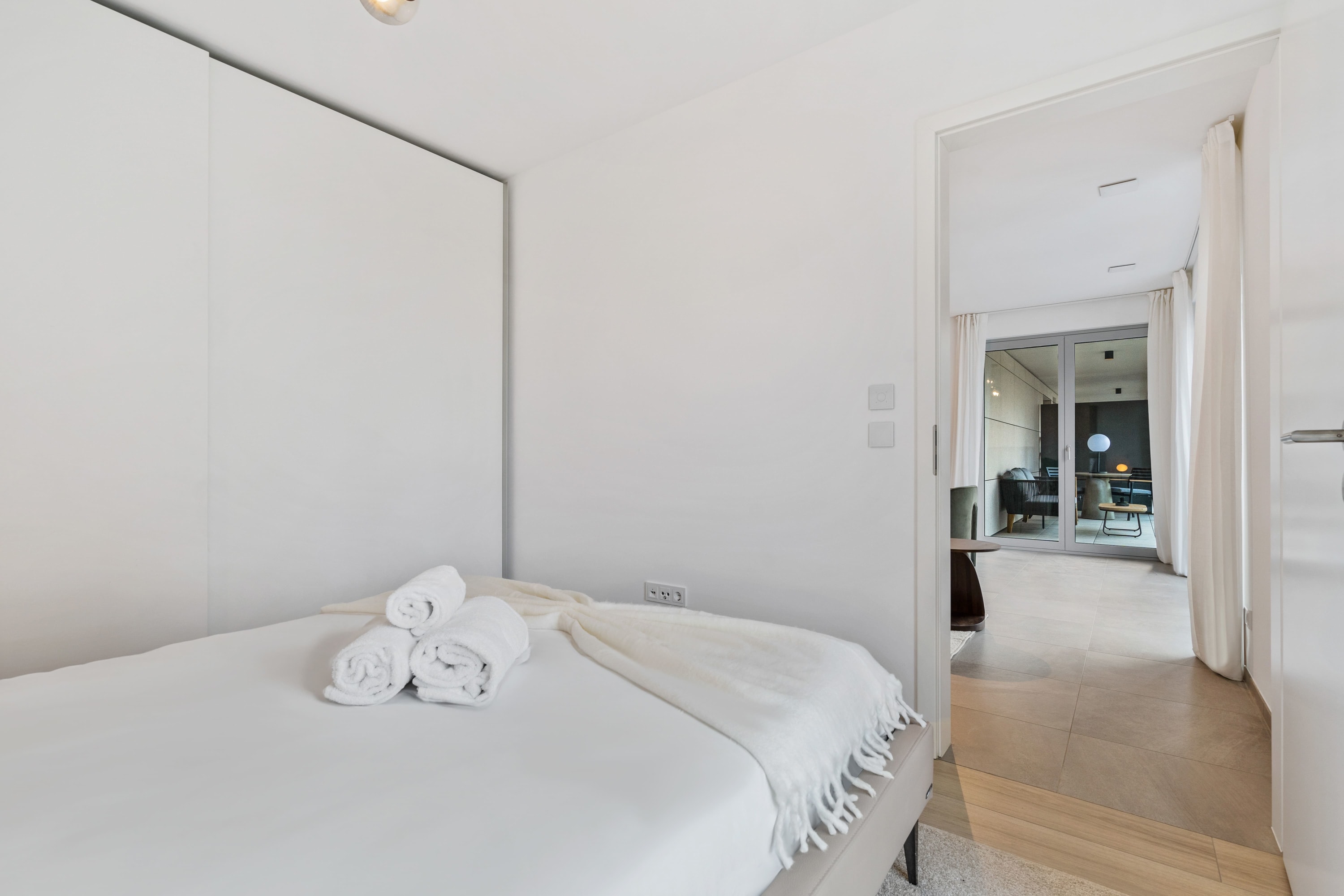 Minimalist design, maximum comfort: a peaceful bedroom retreat.