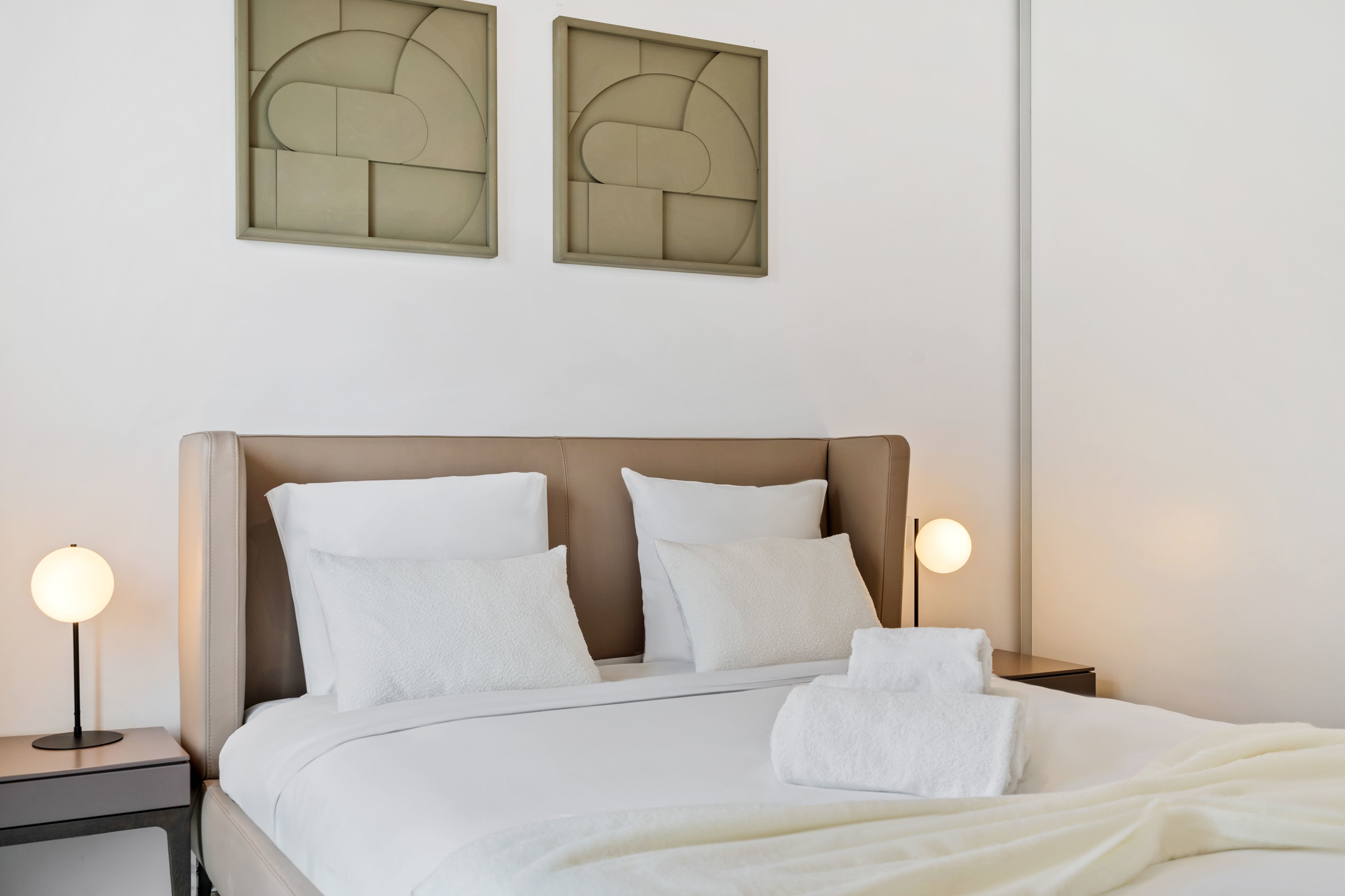 Chic and serene bedroom, perfect for a restful night's sleep.