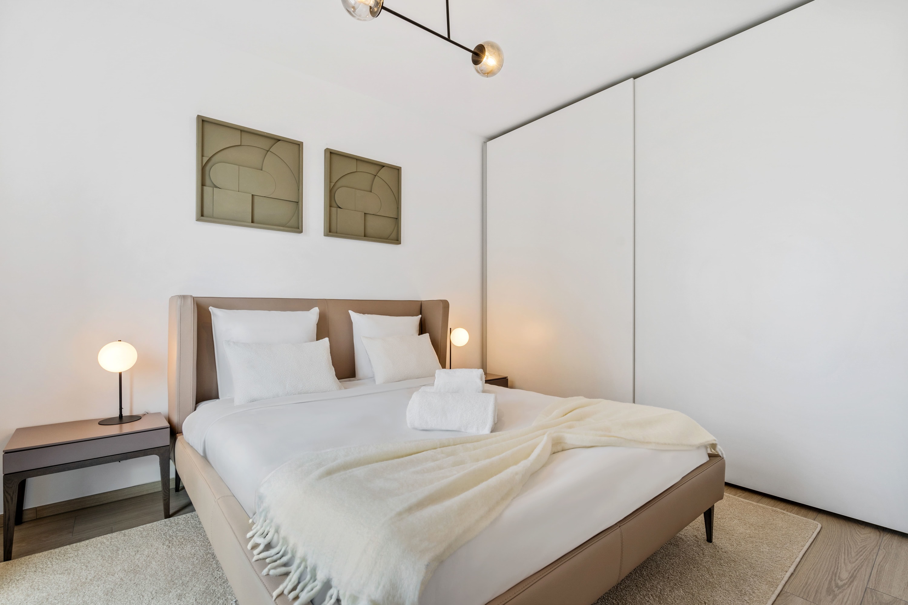 Luxuriate in the understated elegance of our spacious bedroom.