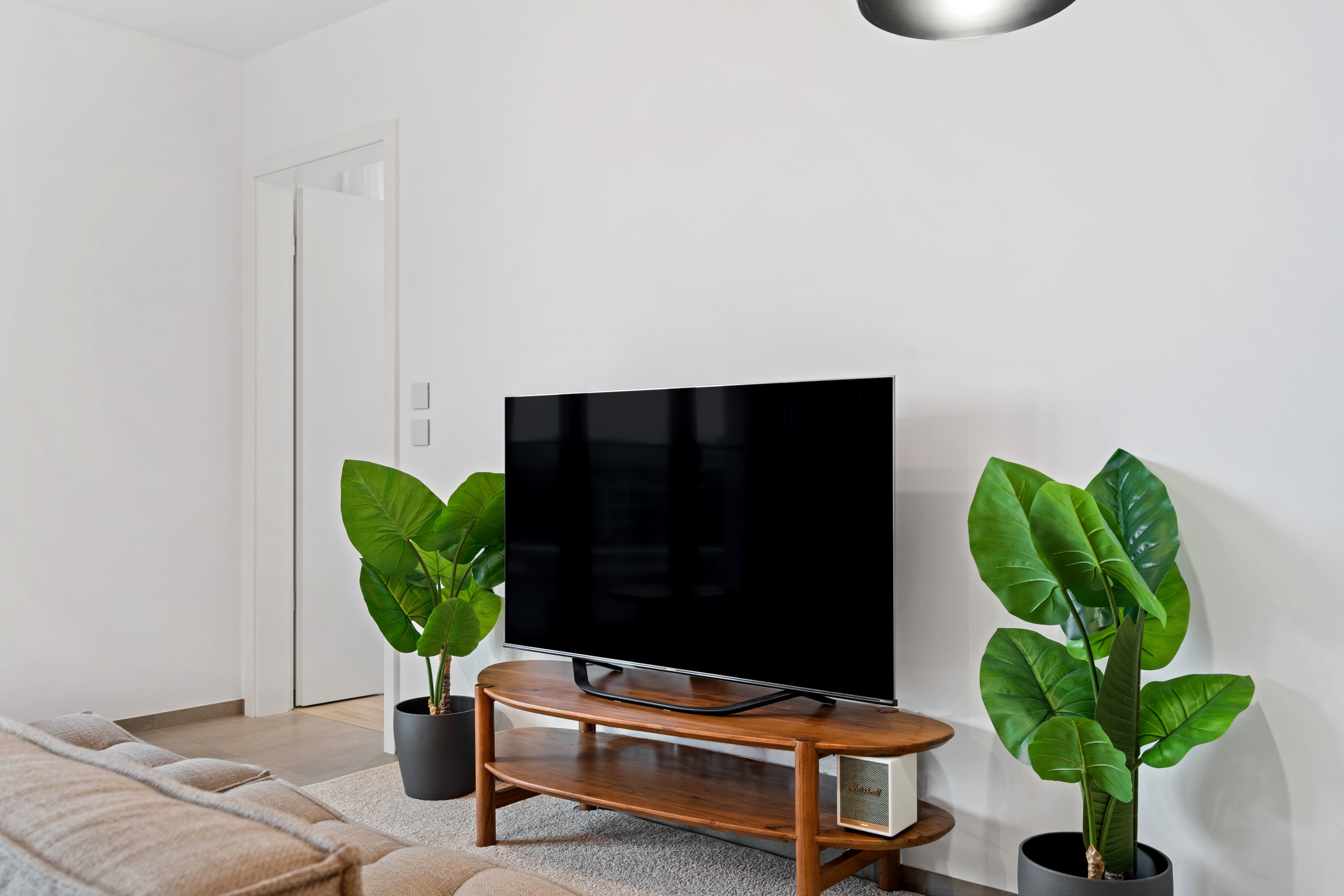 Our minimalist living room is the perfect spot to unwind and entertain.