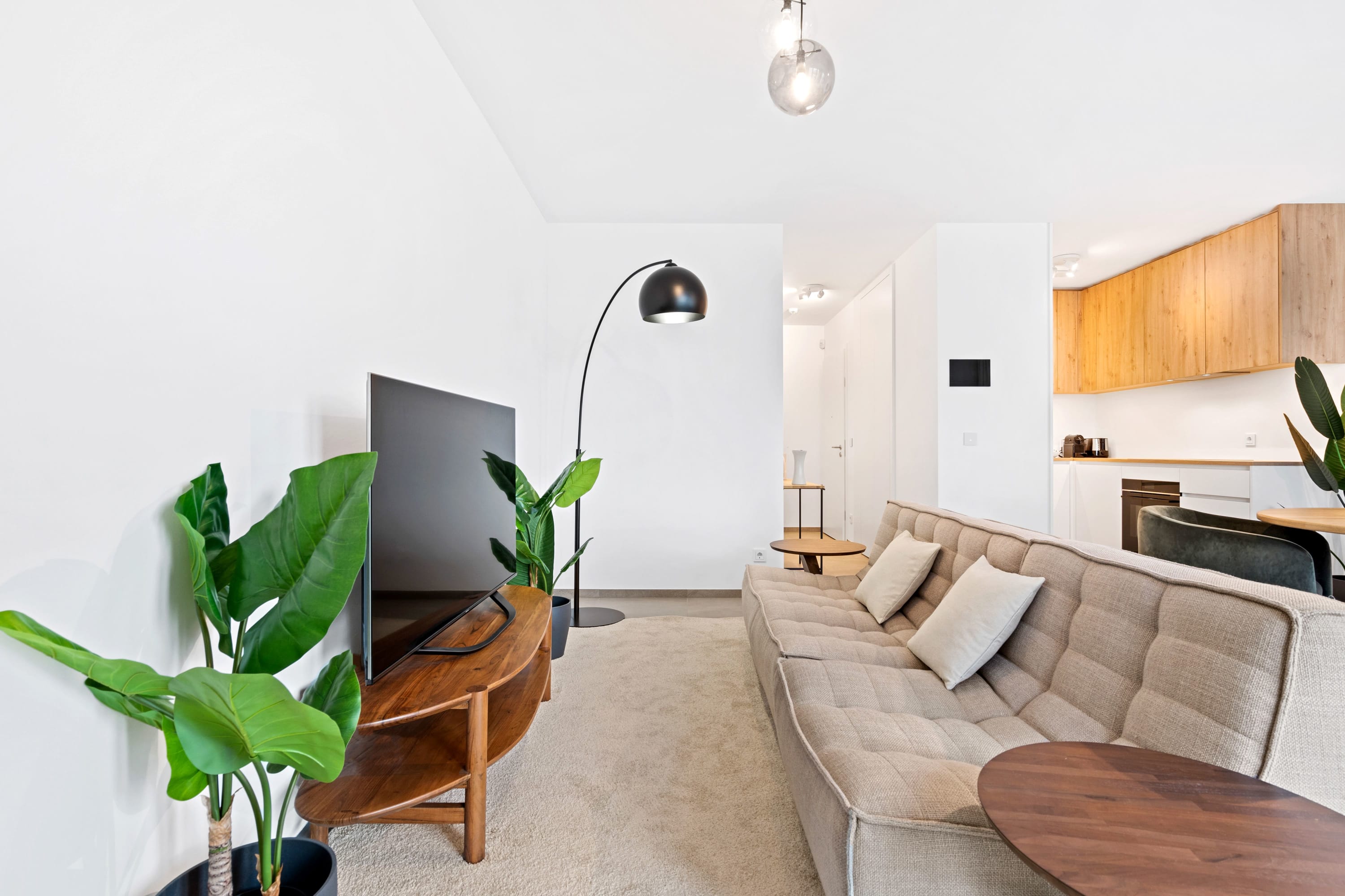 Spacious and bright, this living room is the heart of our home-away-from-home.