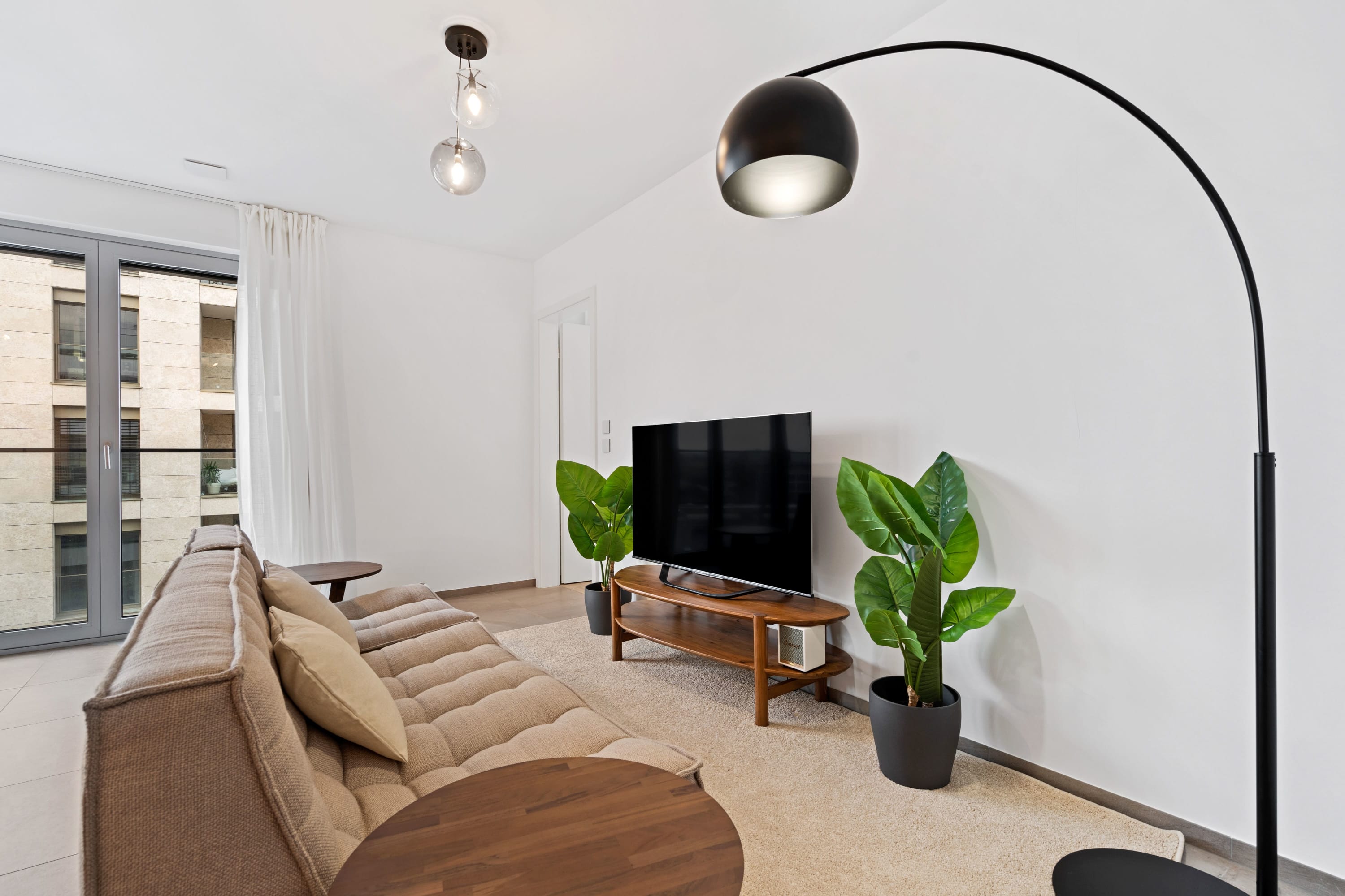 Streamlined elegance: A serene space to relax and connect with loved ones.