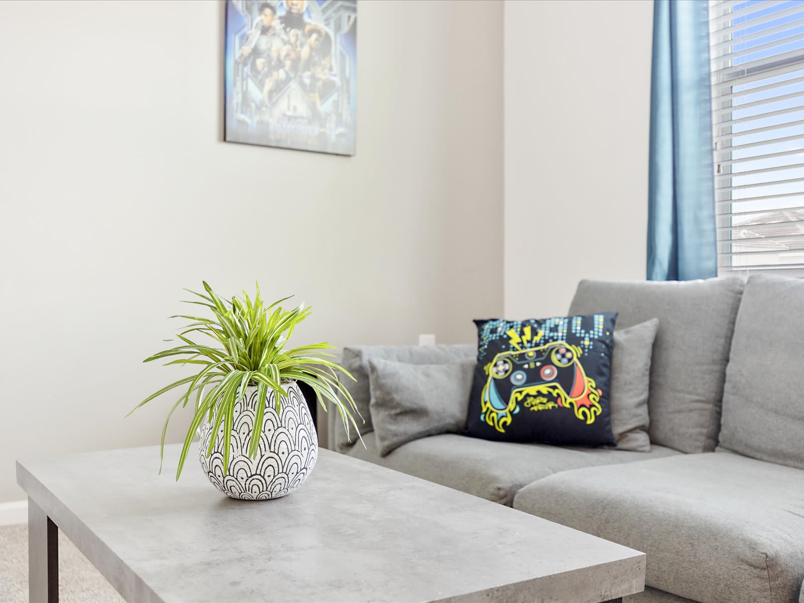 Cozy living room corner w/ sectional seating & inviting decor.