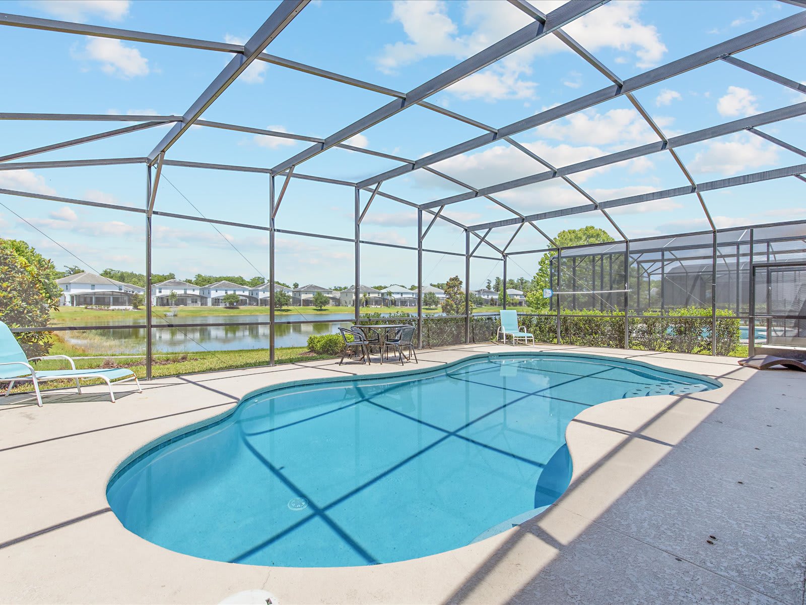 Sun-filled screened pool w/ clear views & plenty of deck space.