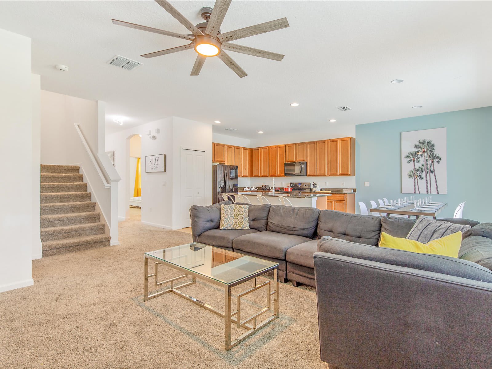 Open living area flowing into the kitchen, perfect for group time.
