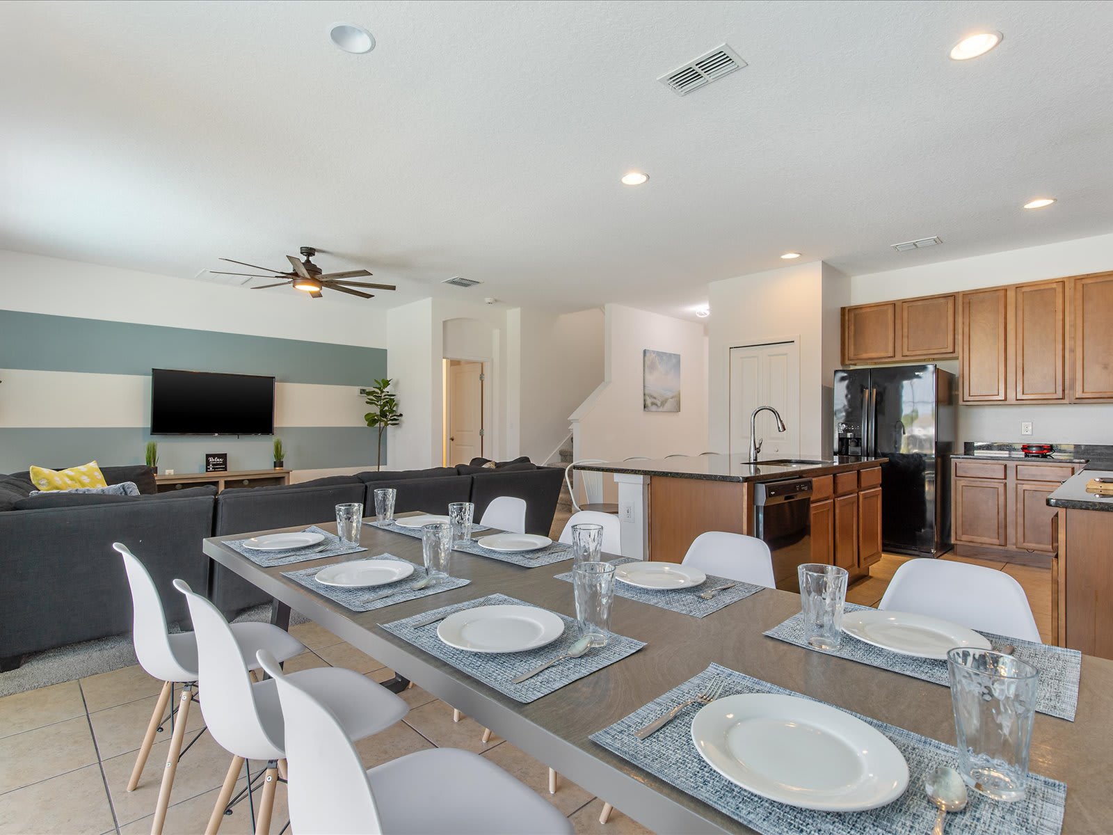 Inviting open living space perfect for gathering, dining, & relaxing together.