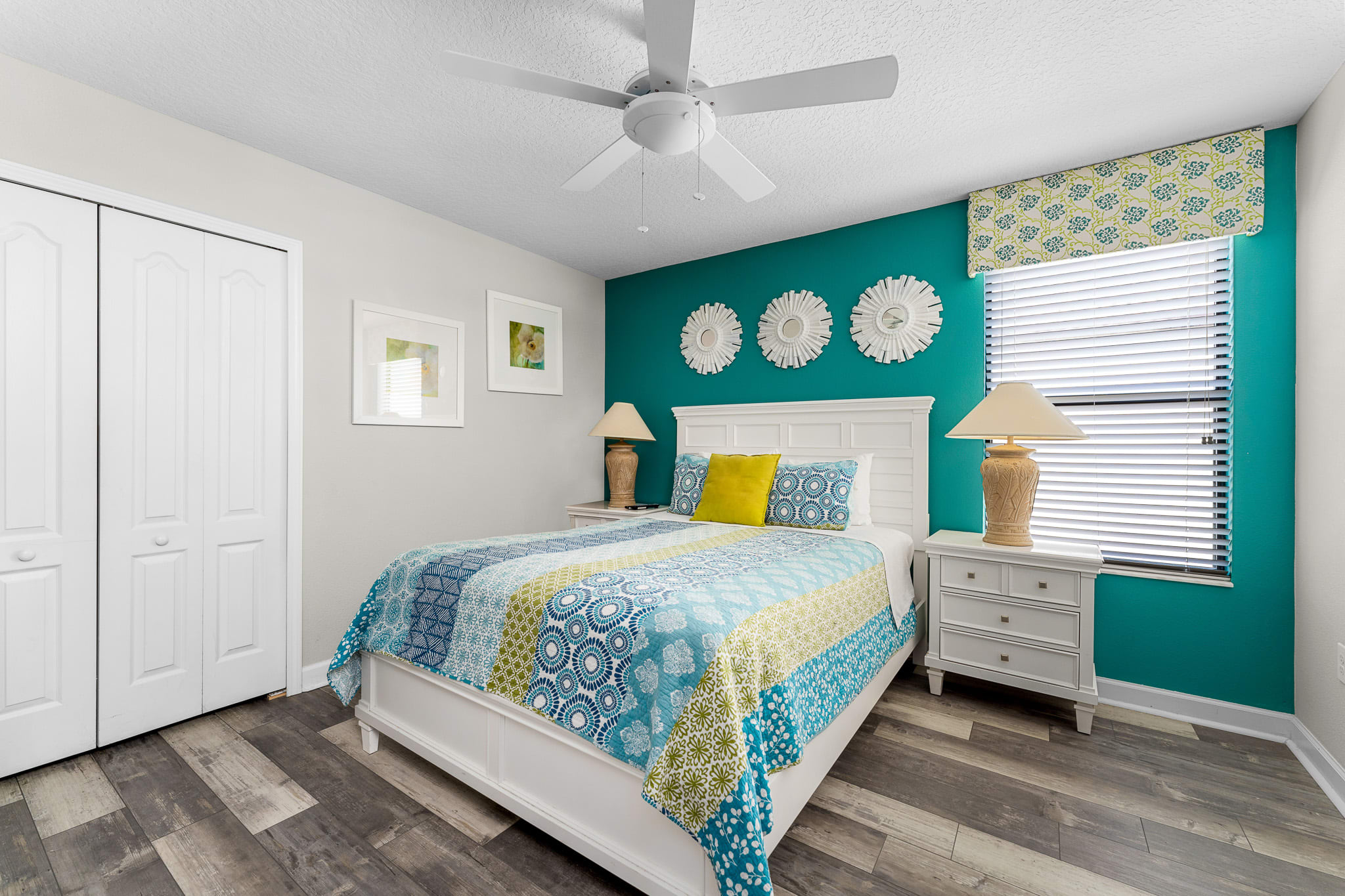 Cozy bedroom w/ bold accents and a comfortable bed for restful nights.