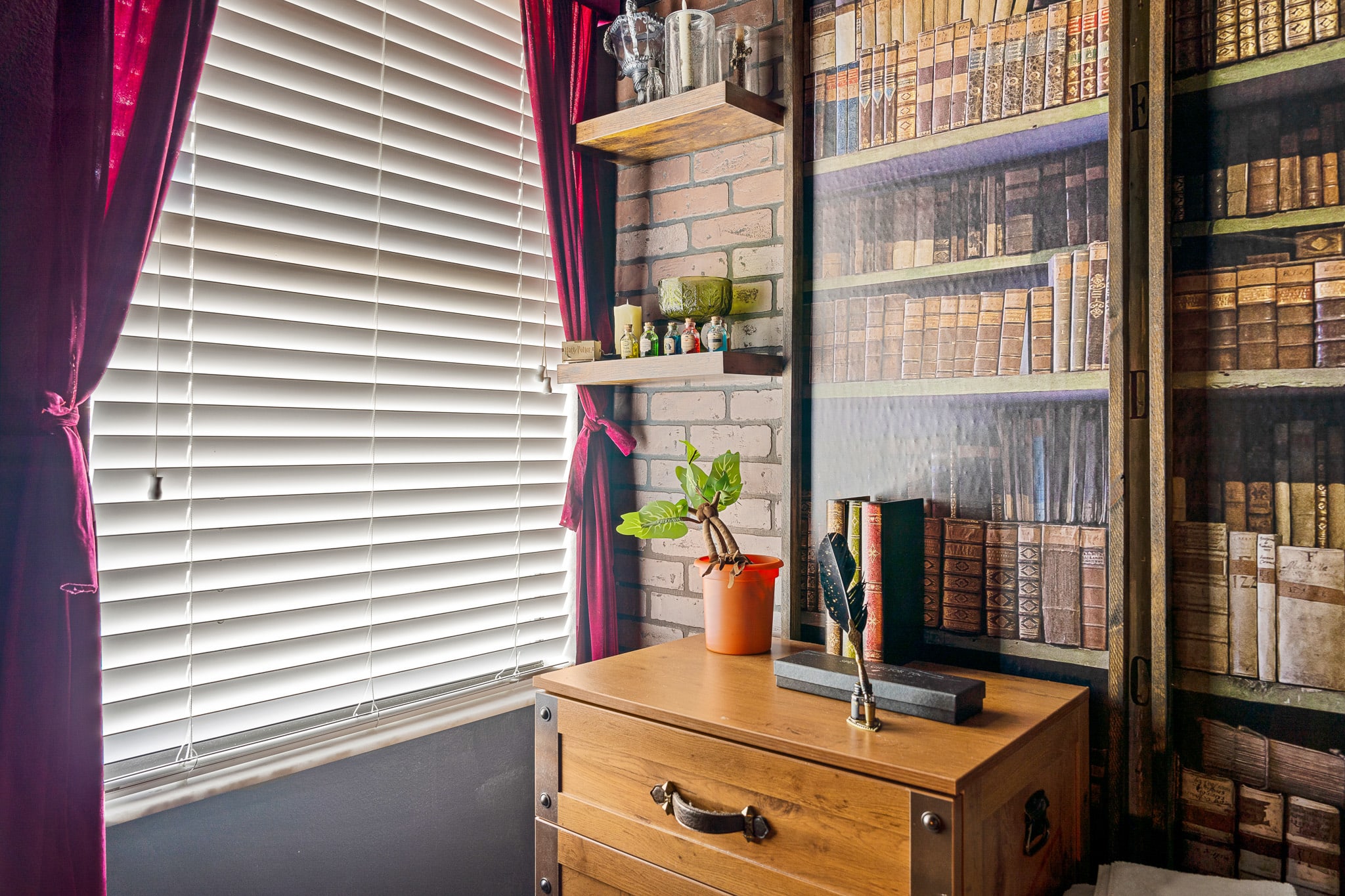Compact workspace w/ desk and chair for quiet focus time.