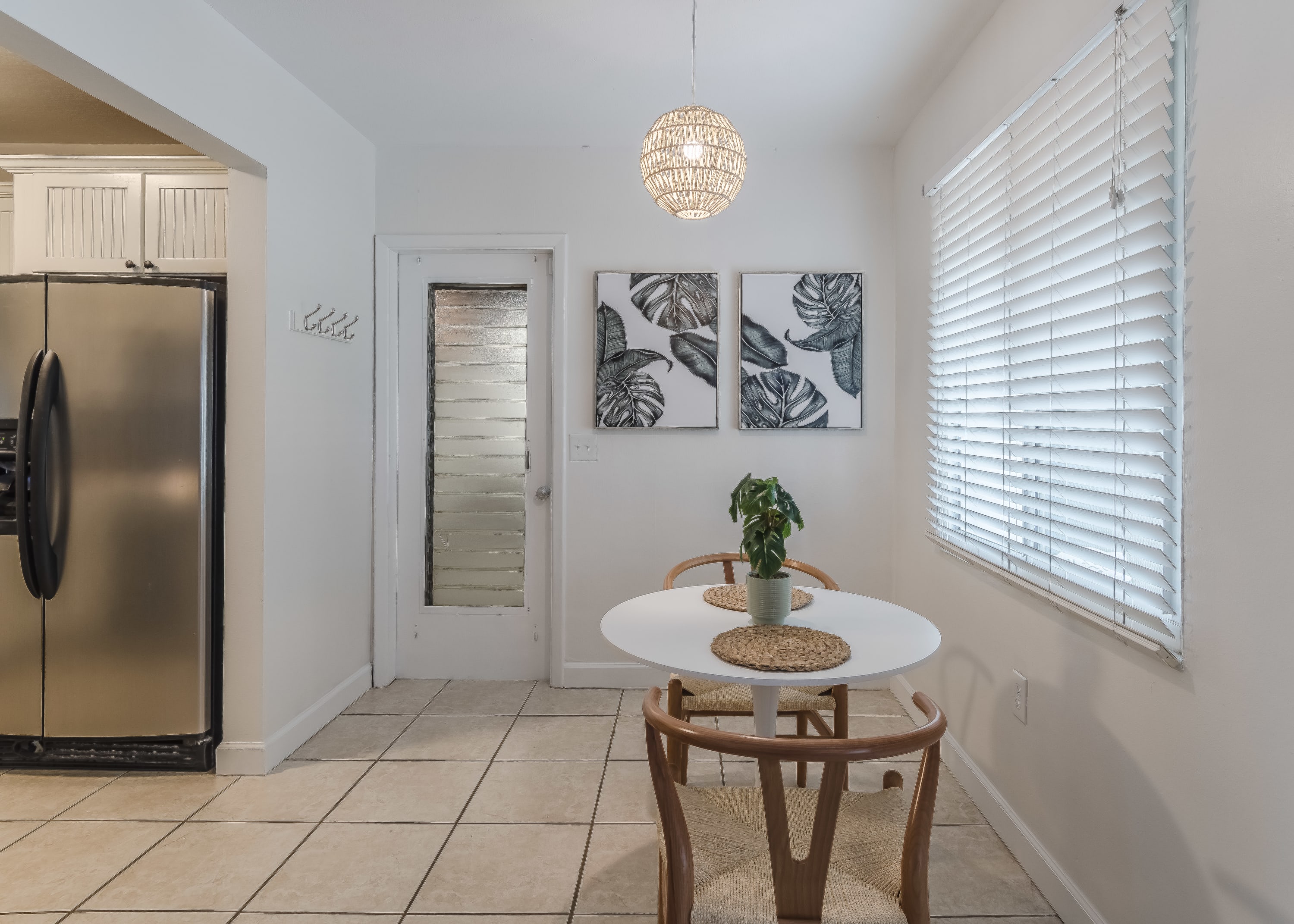 Simple entry table styled w/ greenery and soft lighting