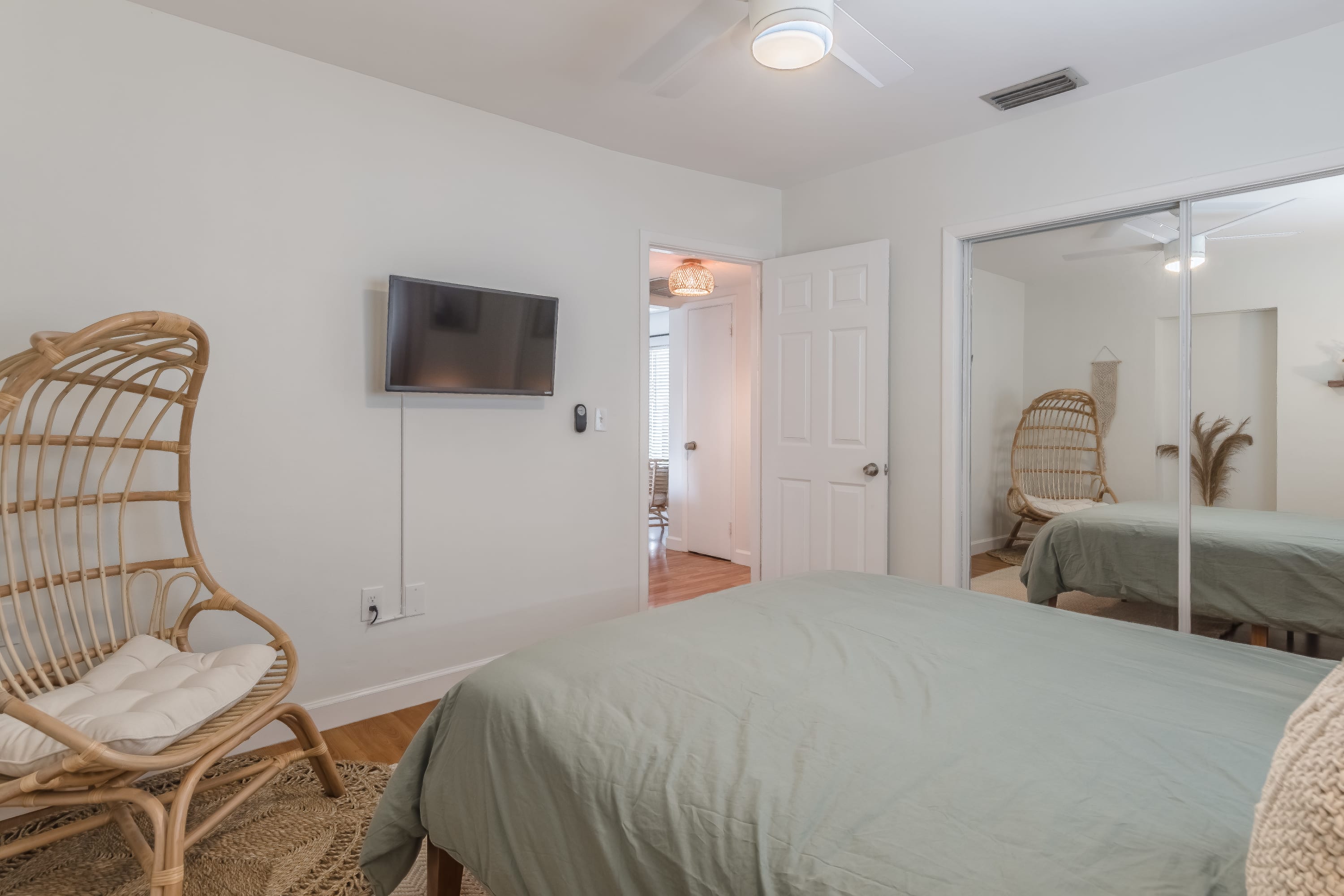 Bedroom view w/ TV and thoughtful touches for downtime