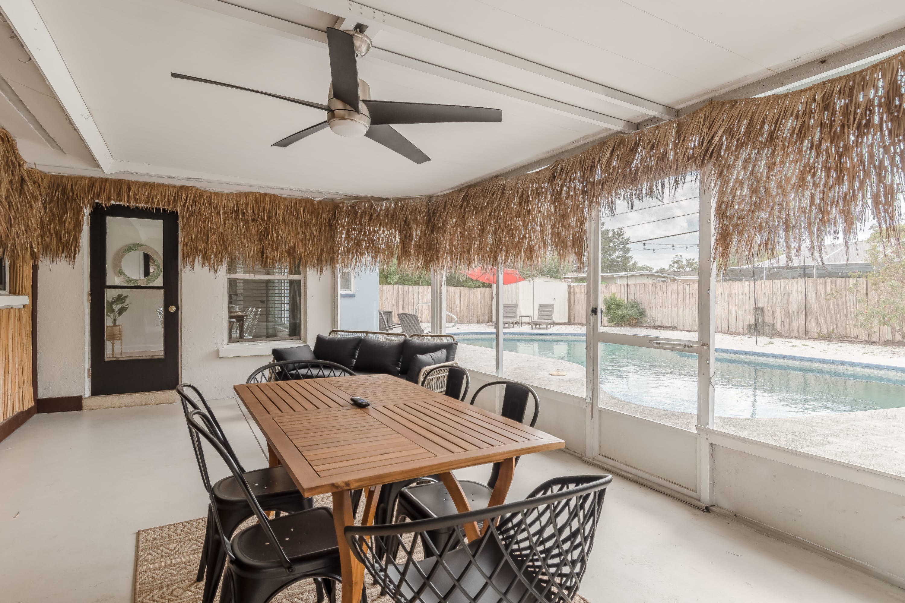 Covered porch dining setup ideal for slow meals and fresh air