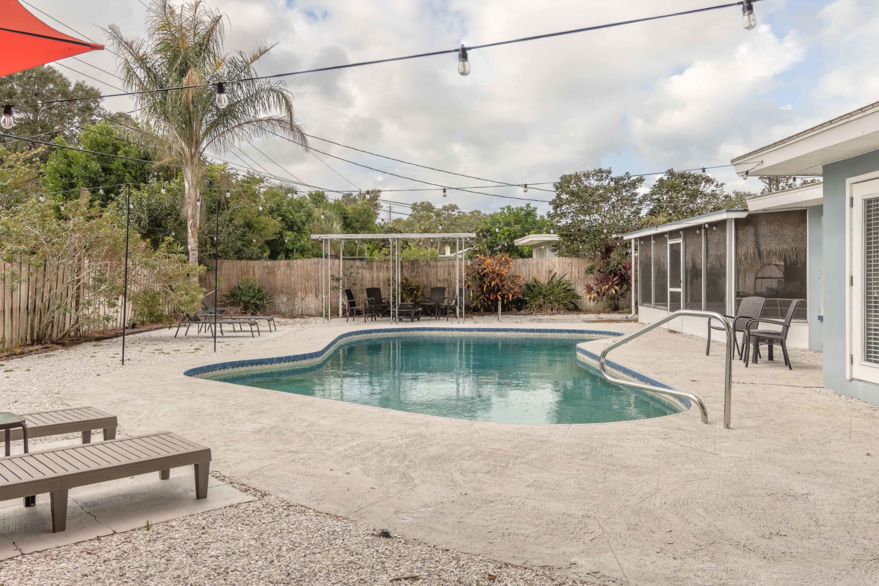 Backyard pool w/ surrounding deck space to unwind