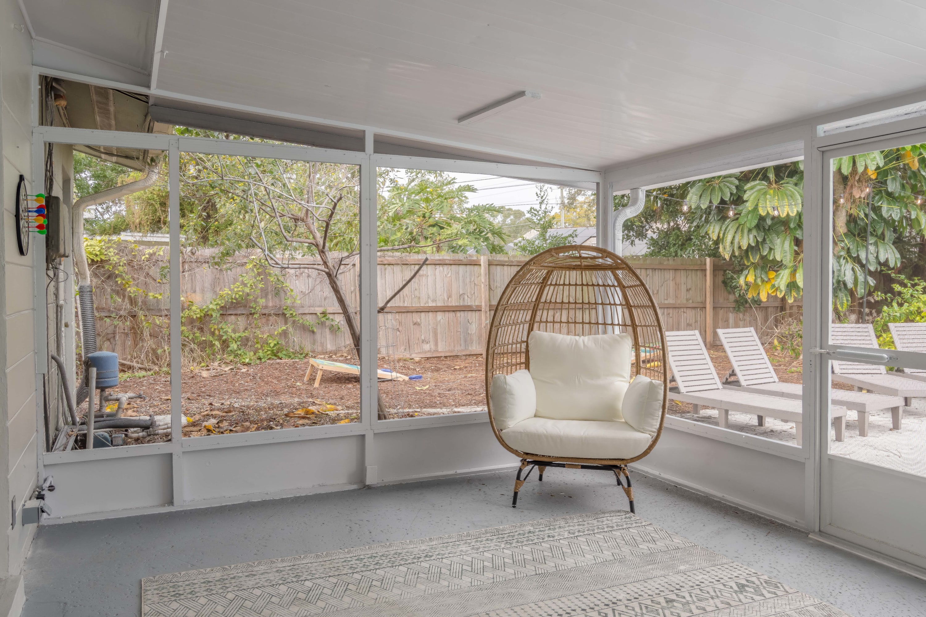 Covered outdoor seating space offering shade and a breezy place to unwind.