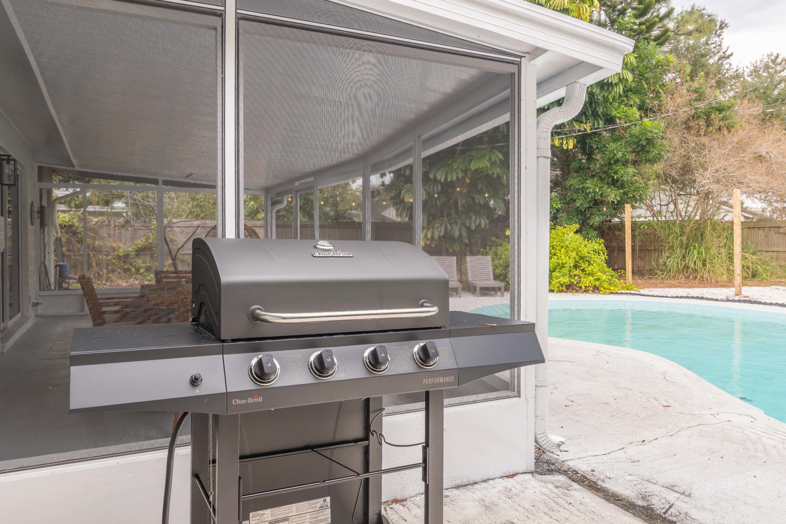 Covered outdoor grill area ready for casual cookouts and easy entertaining.