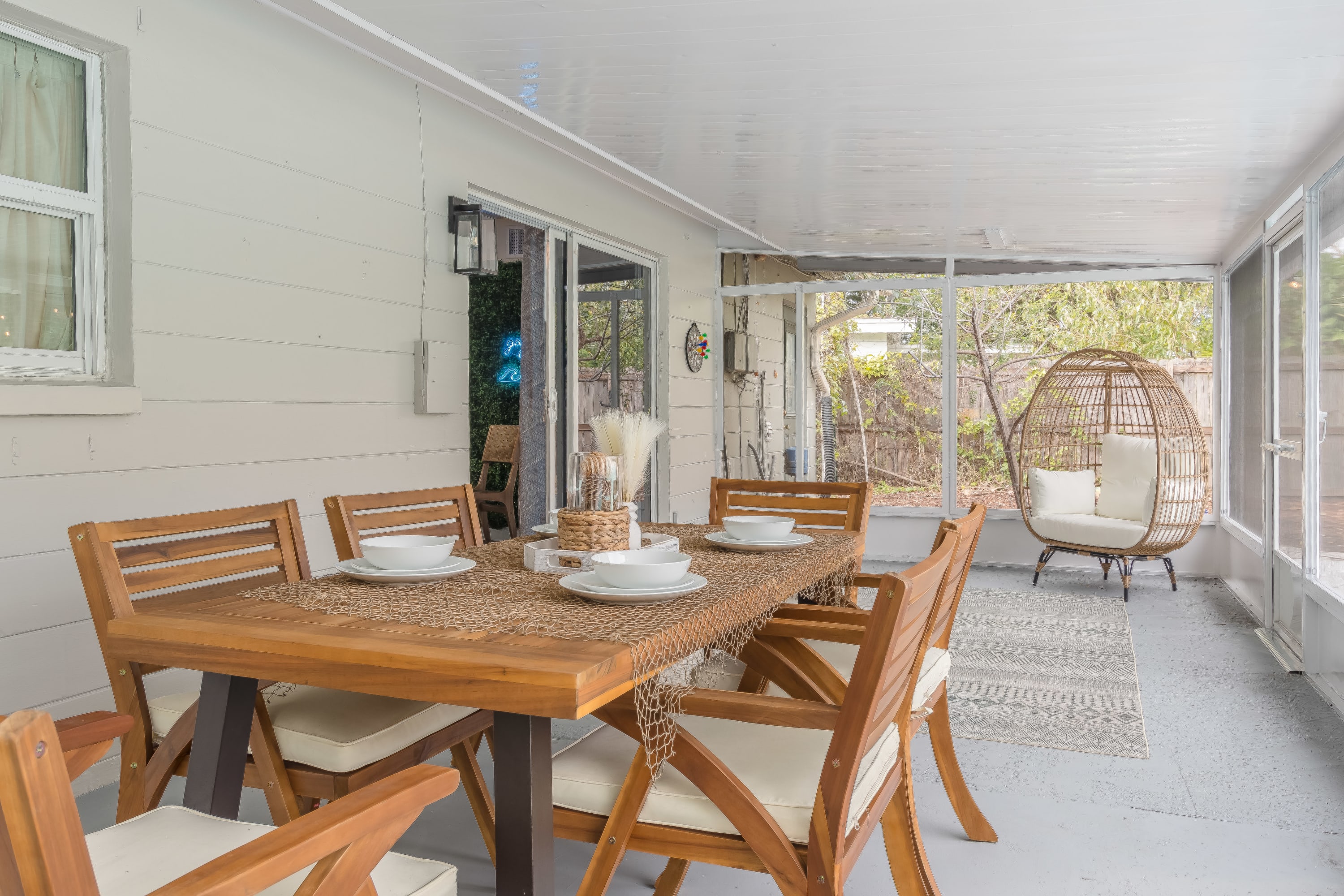 Warm dining area w/ wood table and open flow, great for shared meals.