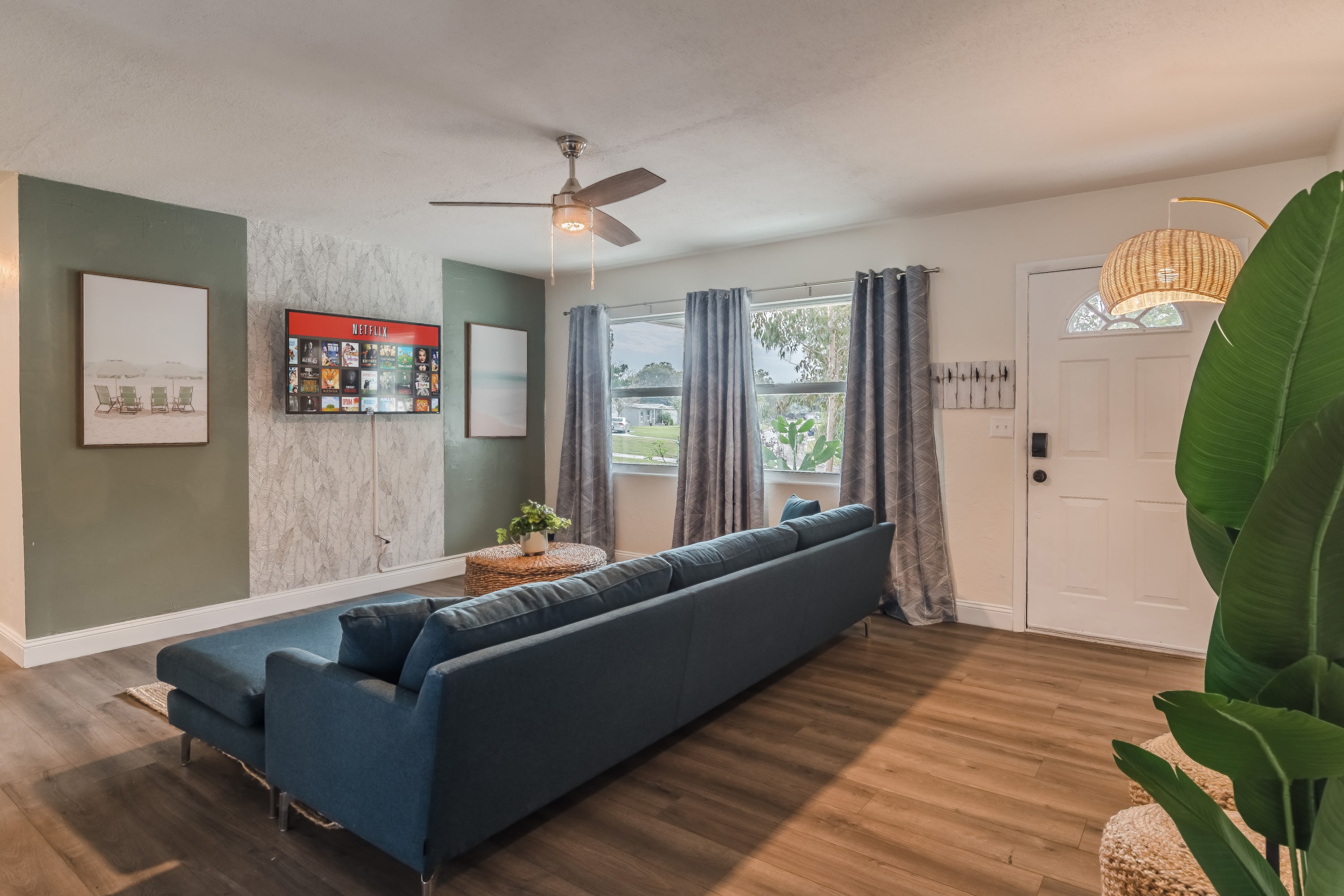 Inviting living room w/ sectional seating and natural light throughout.