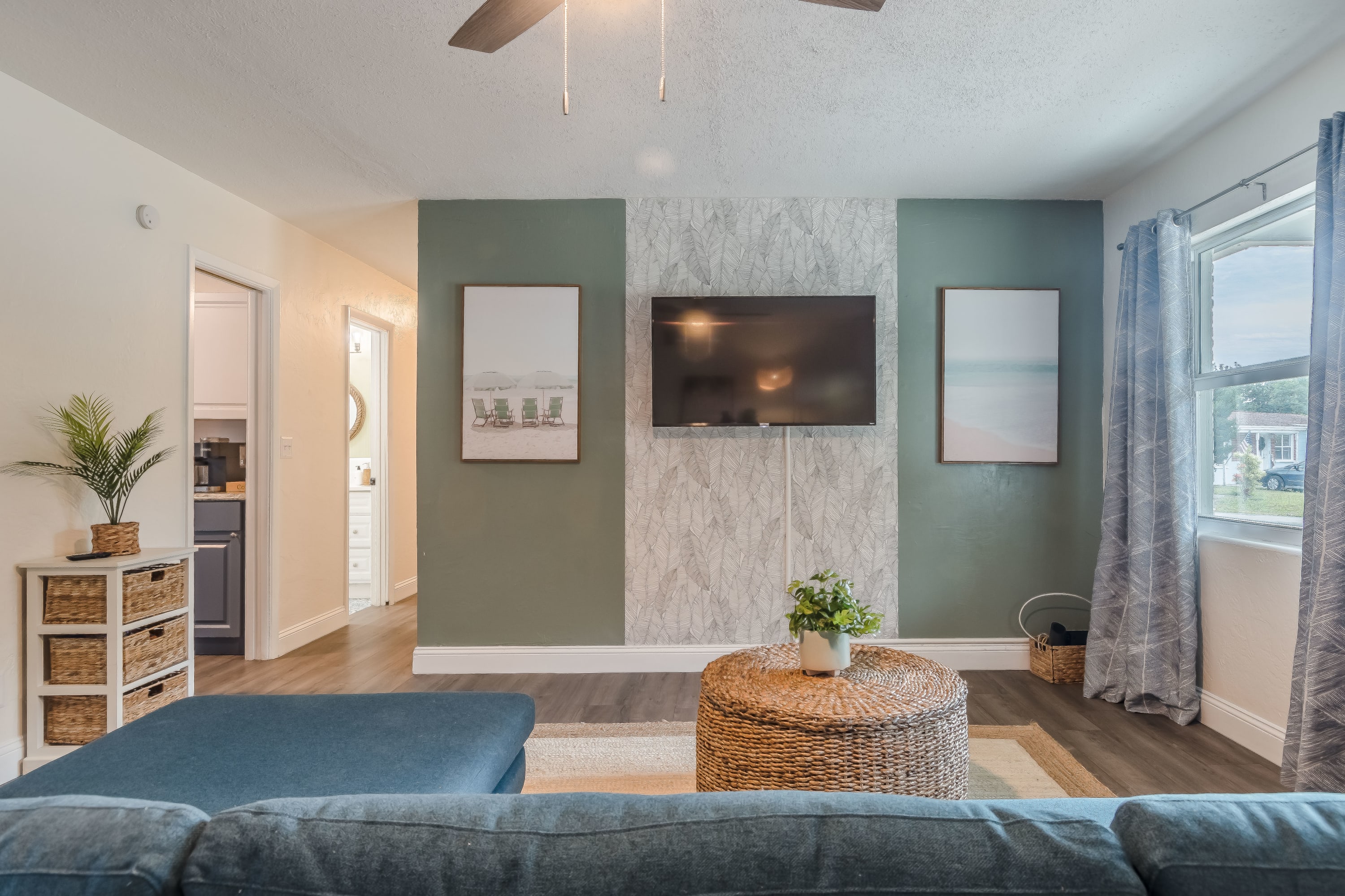 Airy living space w/ comfortable seating and a relaxed, welcoming feel.