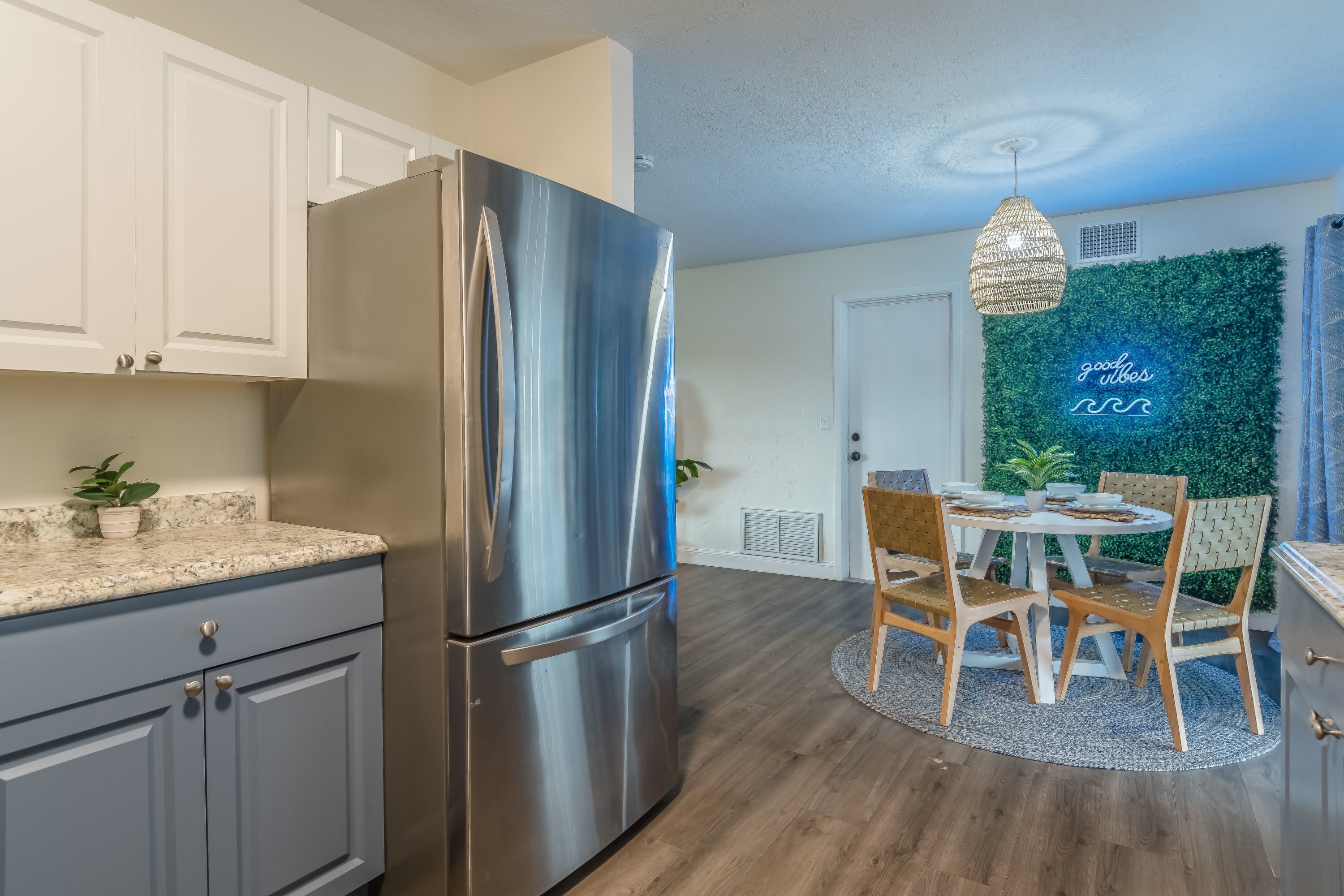 Open kitchen & dining area w/ casual seating and a relaxed flow.