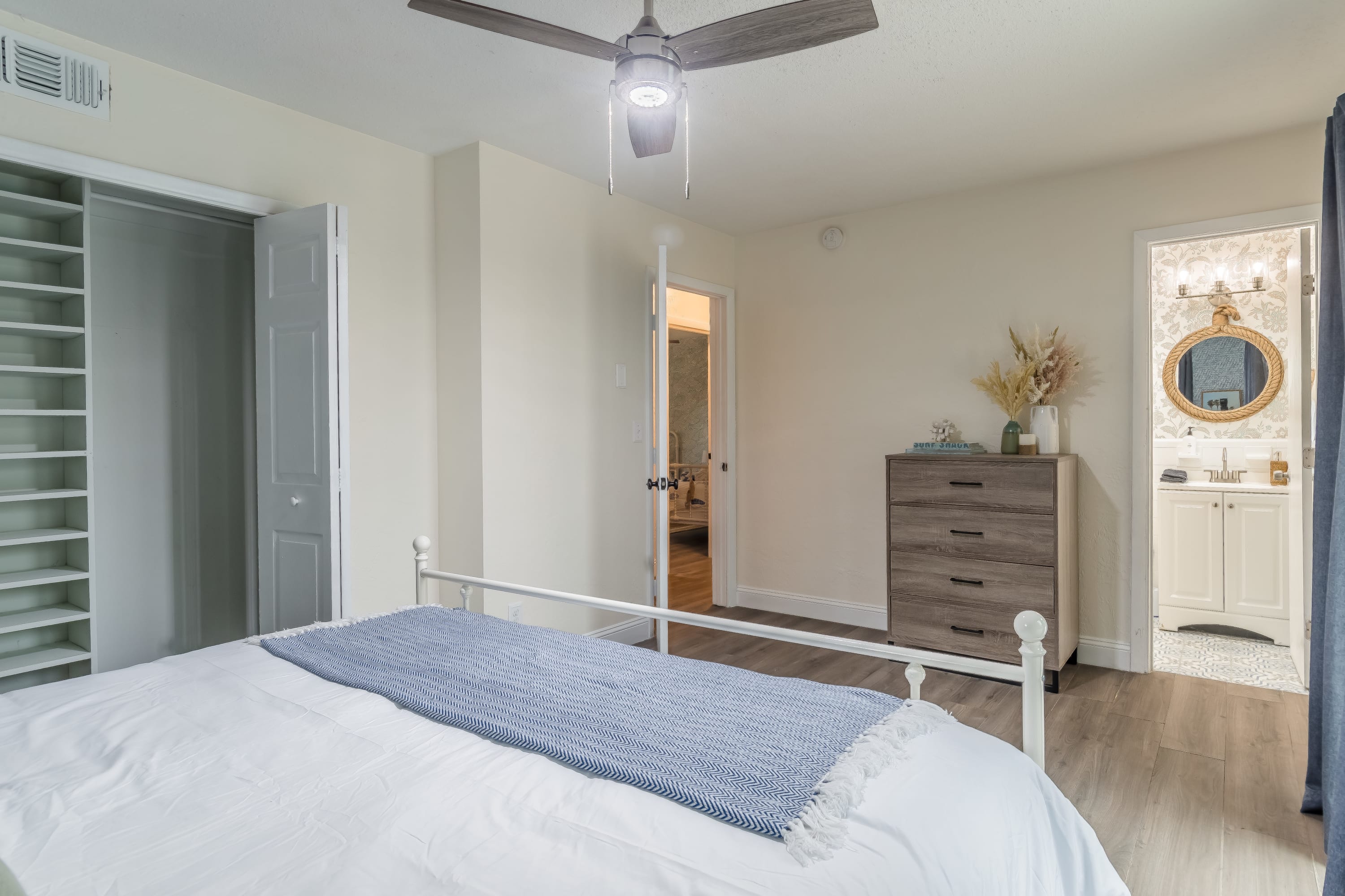 Bedroom w/ warm tones and cozy details for a relaxing stay.