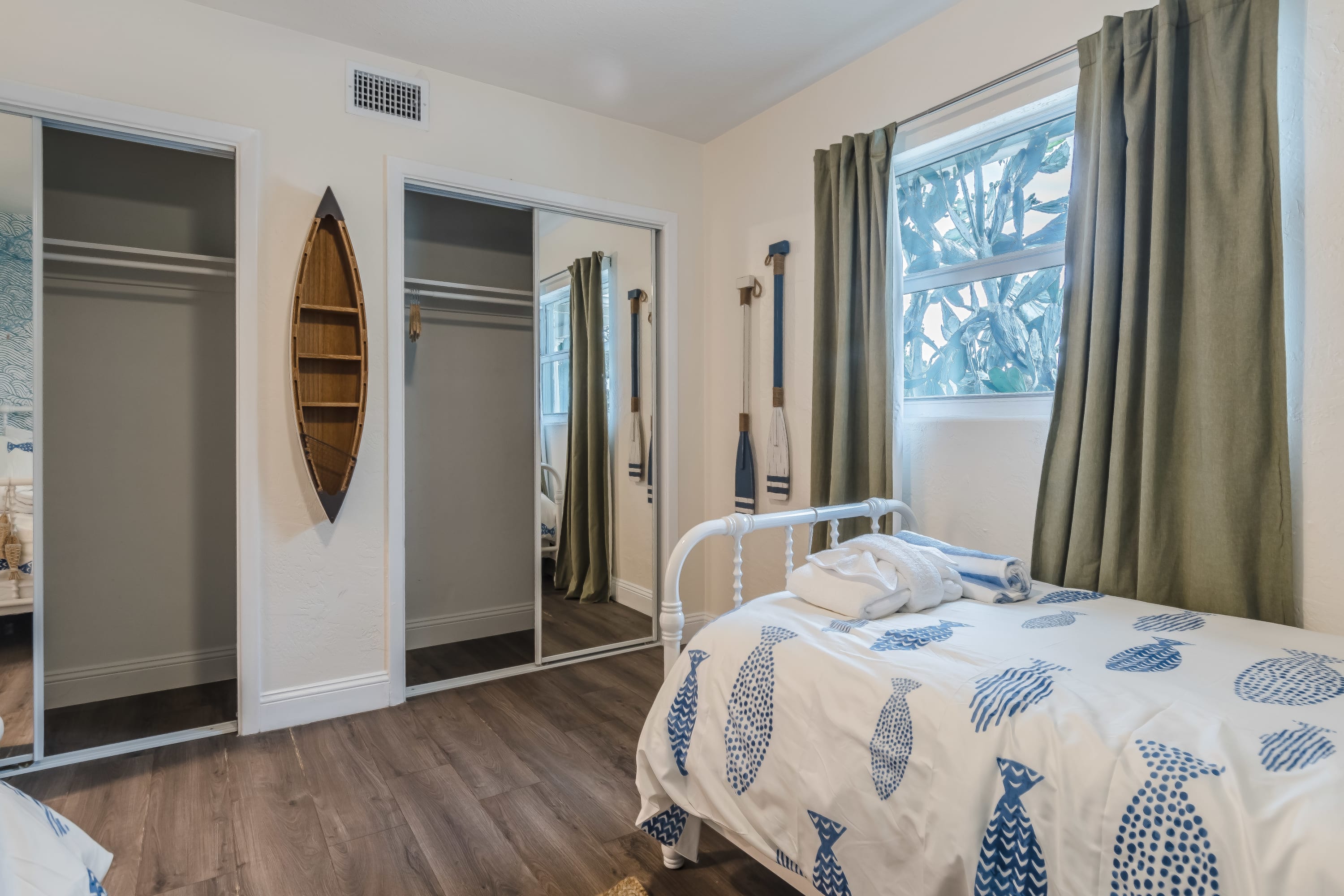 Bright bedroom w/ twin beds and a clean, airy layout for easy comfort.