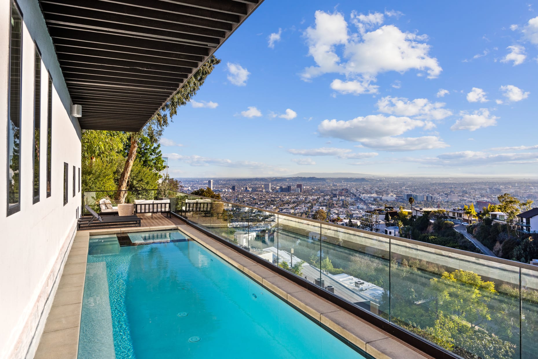 Sip champagne as you soak in panoramic views from your private infinity pool.