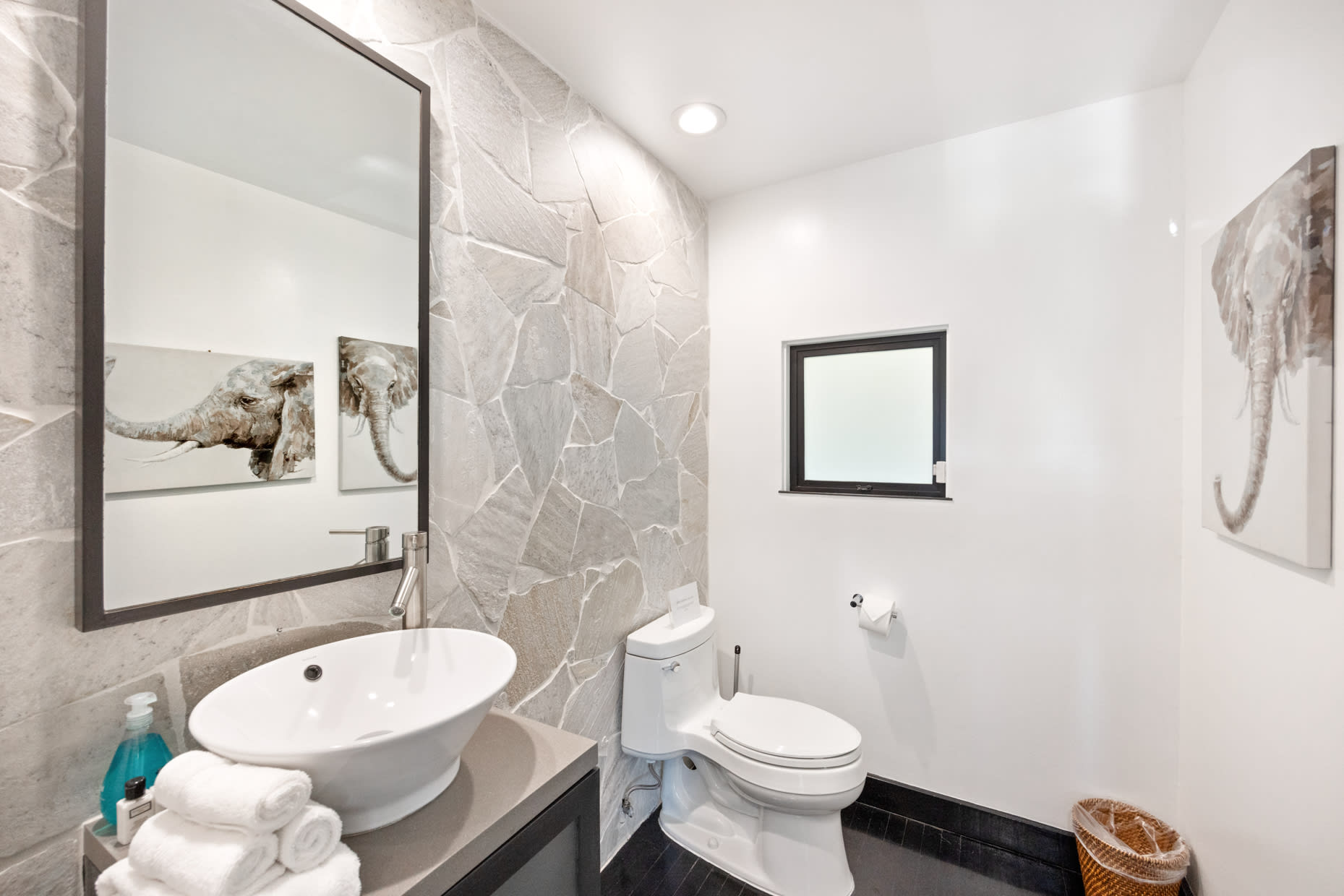 Indulge in luxury with our stylish, minimalist bathrooms, complete with high-end fixtures, plush towels, and premium toiletries.