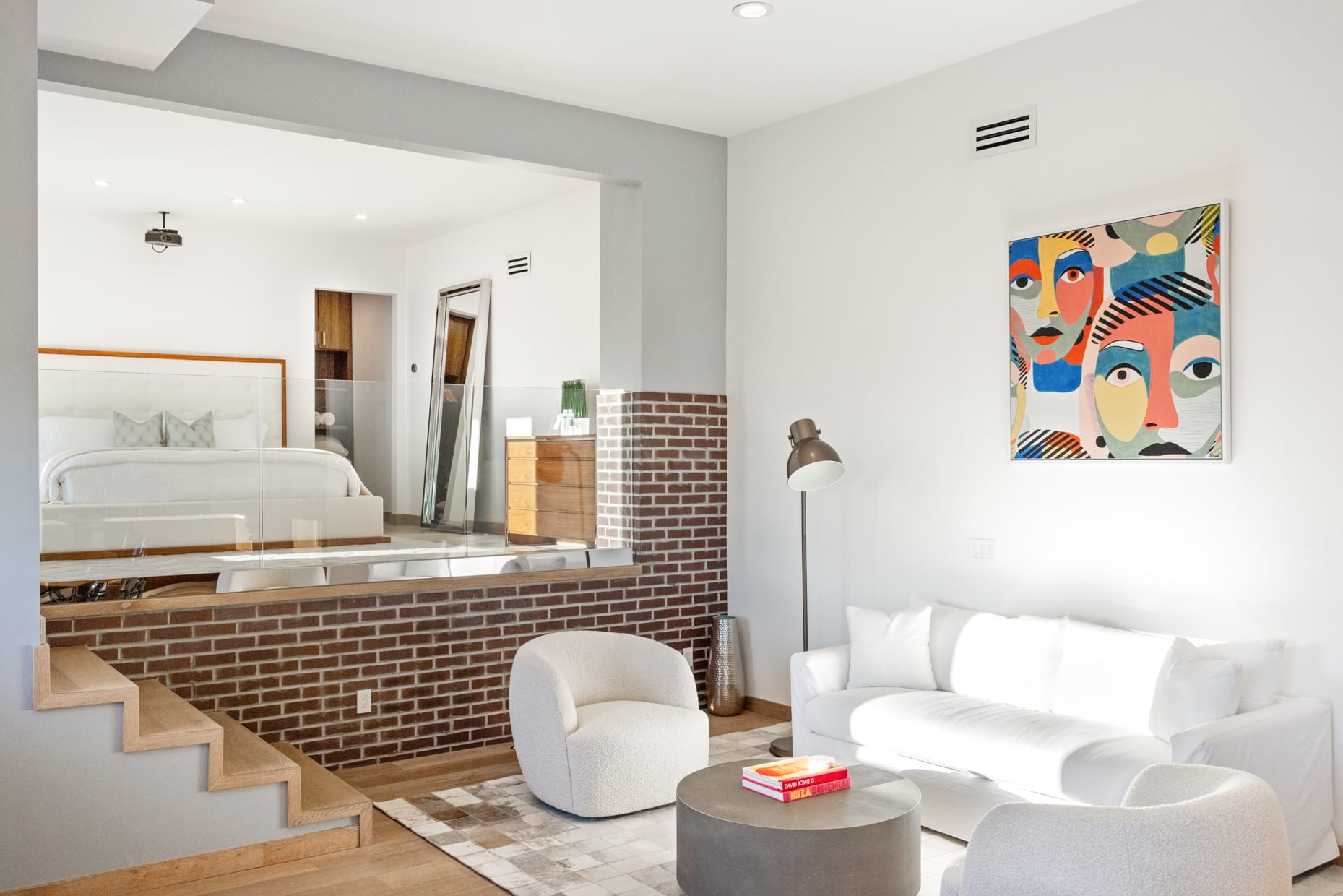 Experience tranquility and comfort in the living space of Guest Bedroom #3, a harmonious blend of style and relaxation.