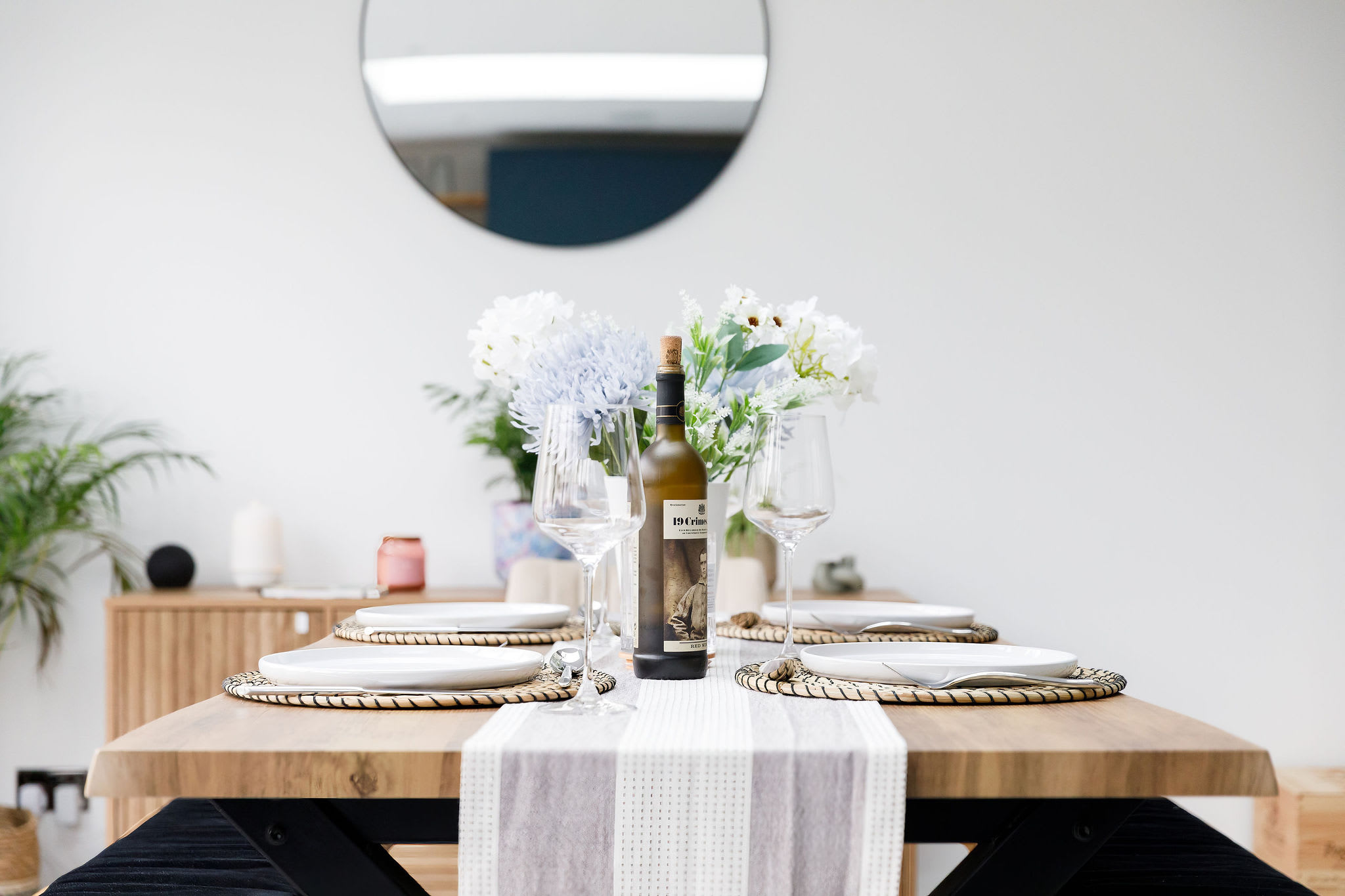 For more formal dining, there is a dining table and bench seating to seat up to 8 guests.