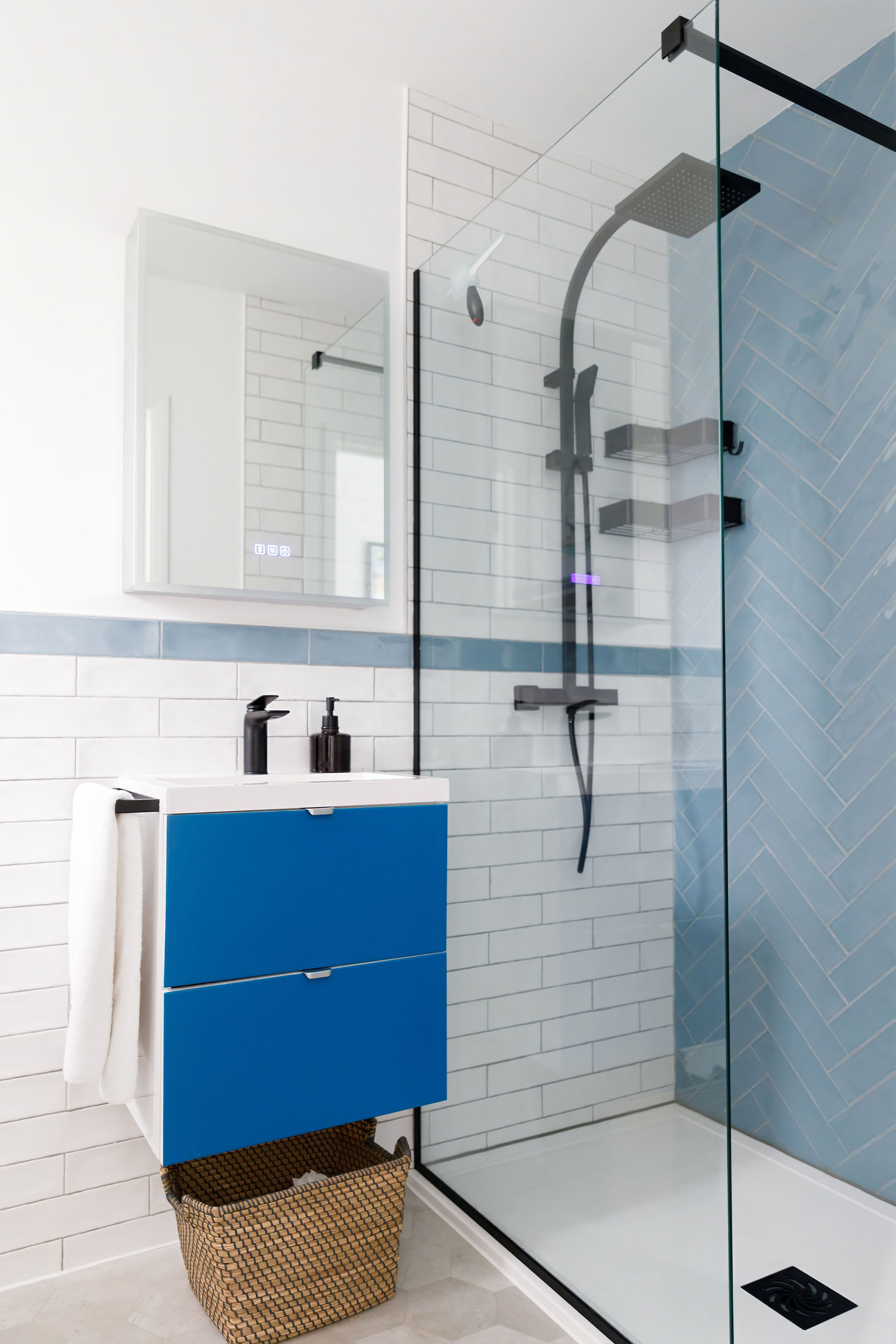 The downstairs has a shower room with large walk-in shower, WC and sink.