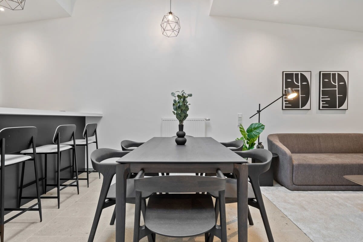 Gather at the table where chic design and comfort make every meal special.