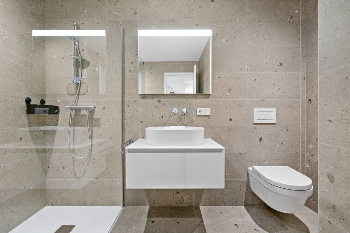 Sleek design meets spa-like tranquility in your private ensuite.