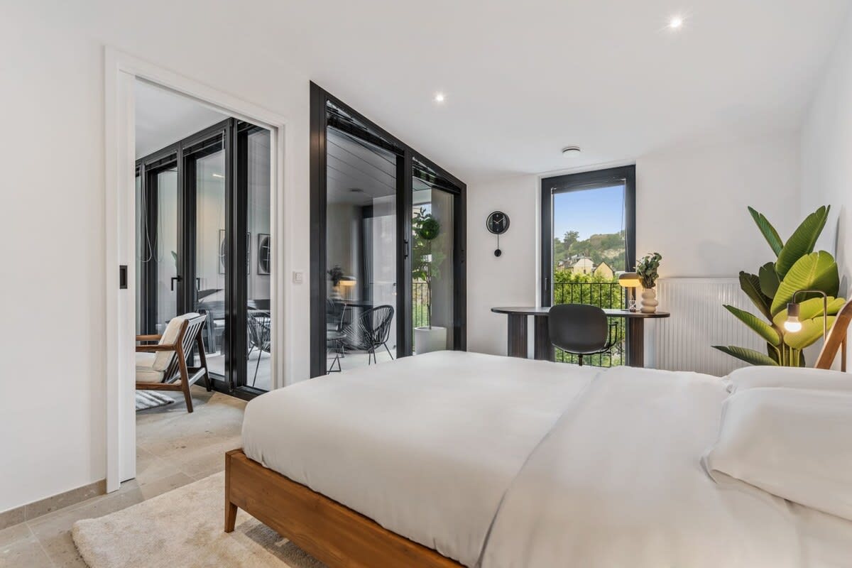 Begin your day with a breath of fresh air from your bedroom's private balcony.