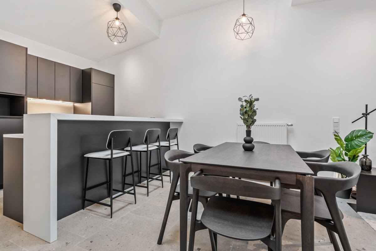 Casual dining or morning coffee, this chic space adapts to your pace.