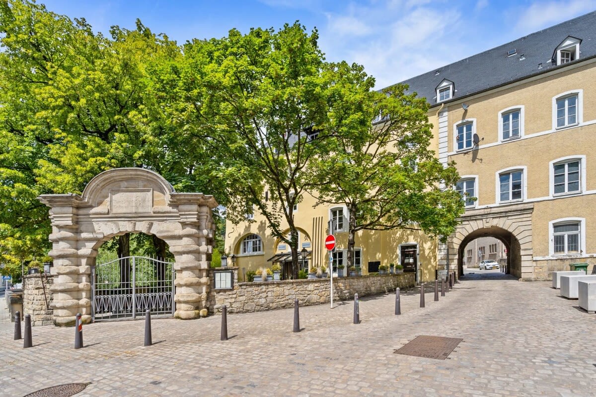 Step through the historic archway to a world of modern comfort and charm.