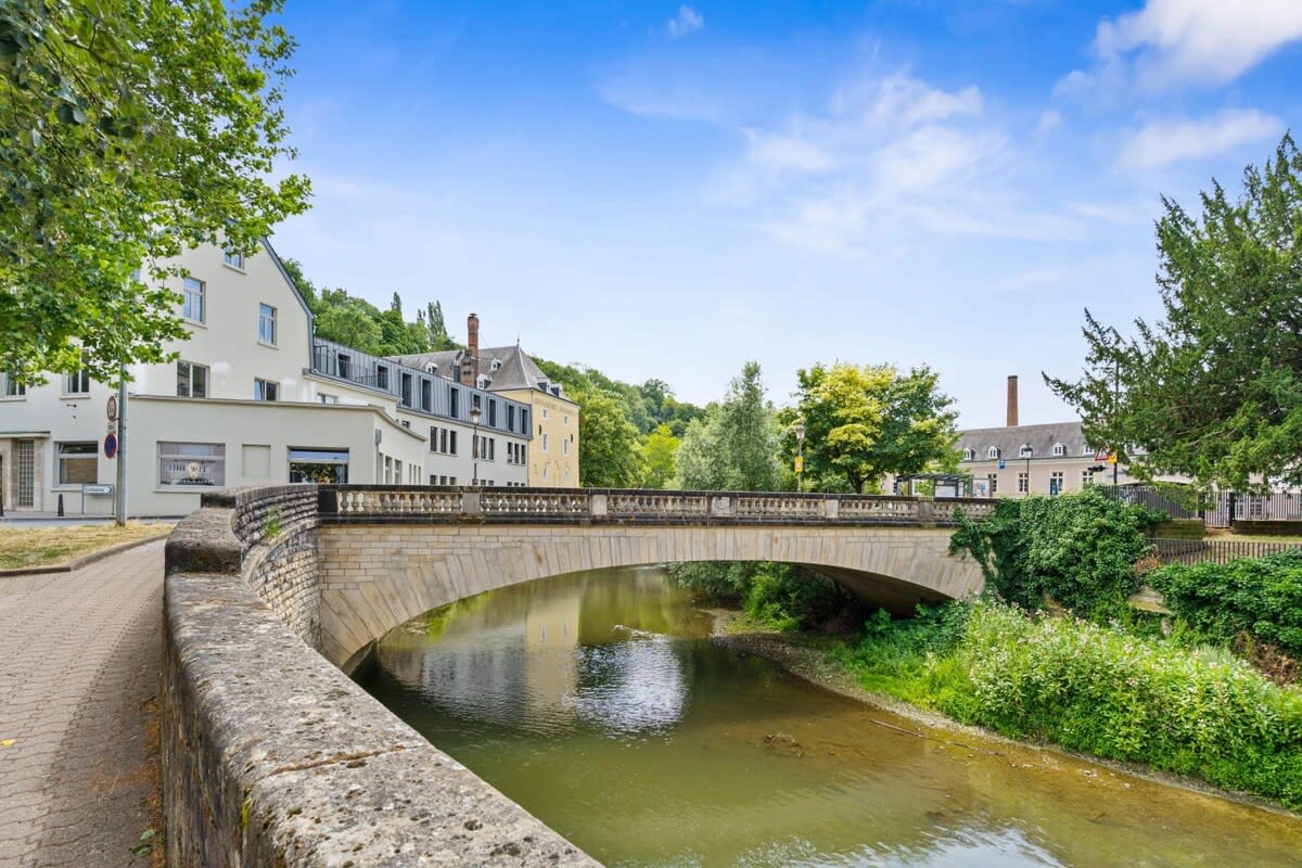 Escape to a serene waterfront residence nestled in historic splendor.