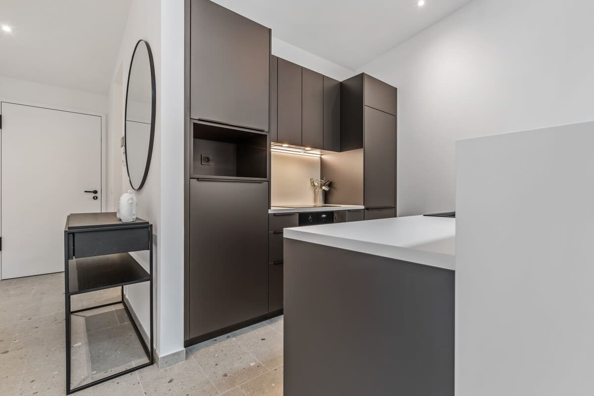 Savor the sleekness of our fully-equipped kitchen, where functionality meets style.