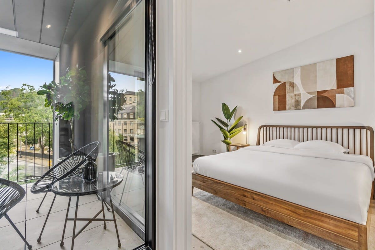 Step out to the balcony from your bedroom to greet the morning light.
